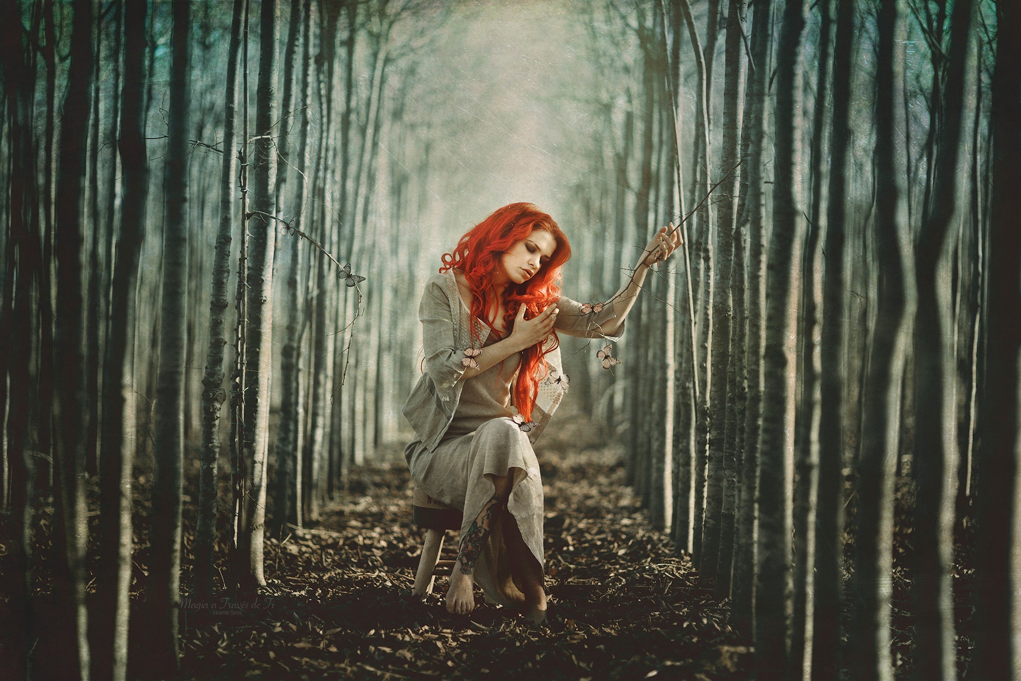 Woman with red hair sitting in a forest HD Wallpaper