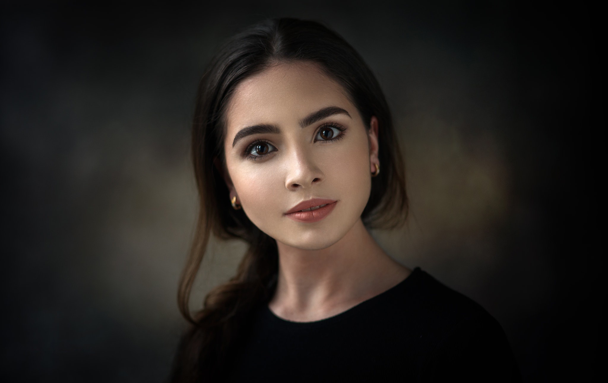 Young woman with brown eyes HD Wallpaper
