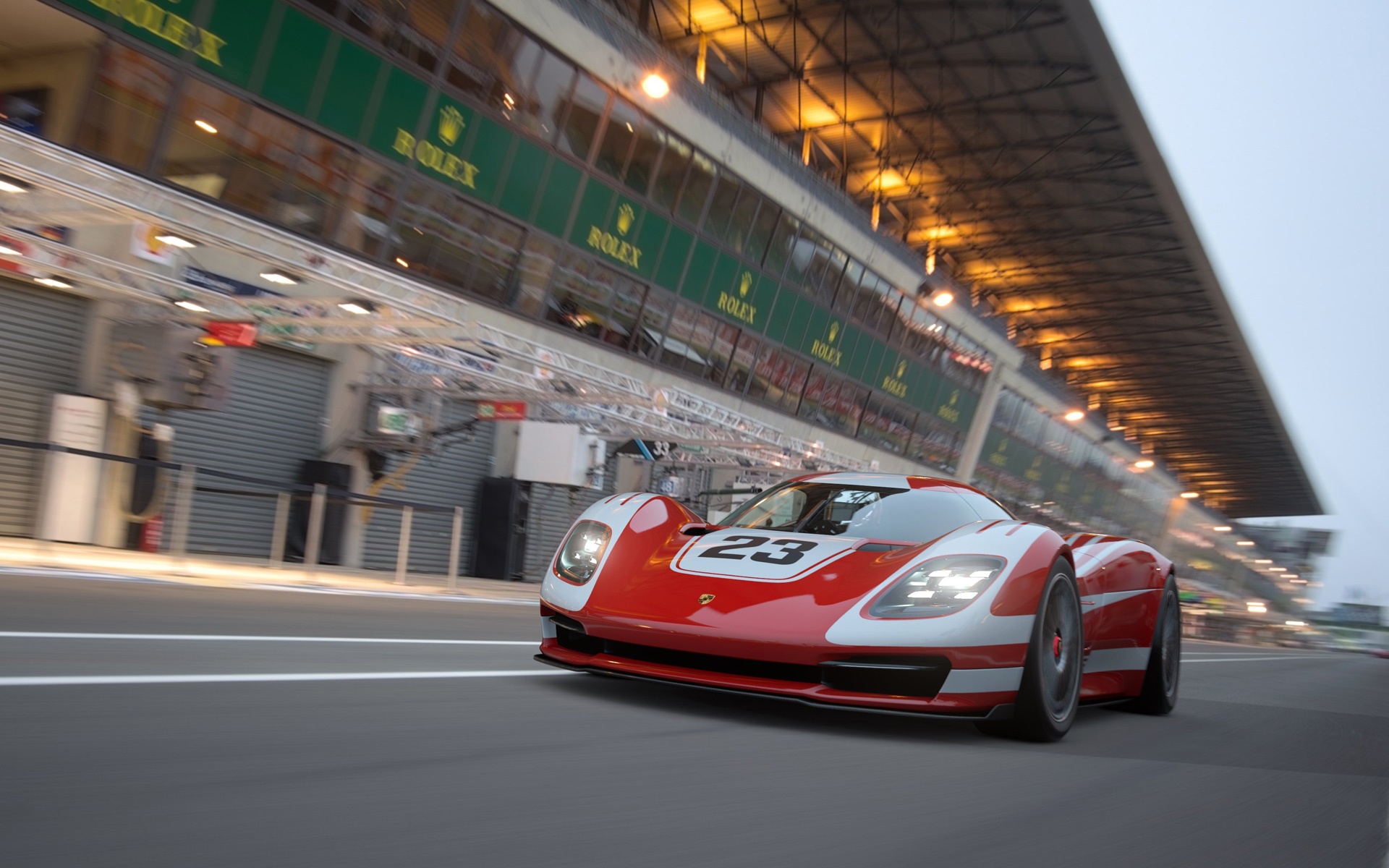 Red and white race car with number 23 on a track HD Wallpaper