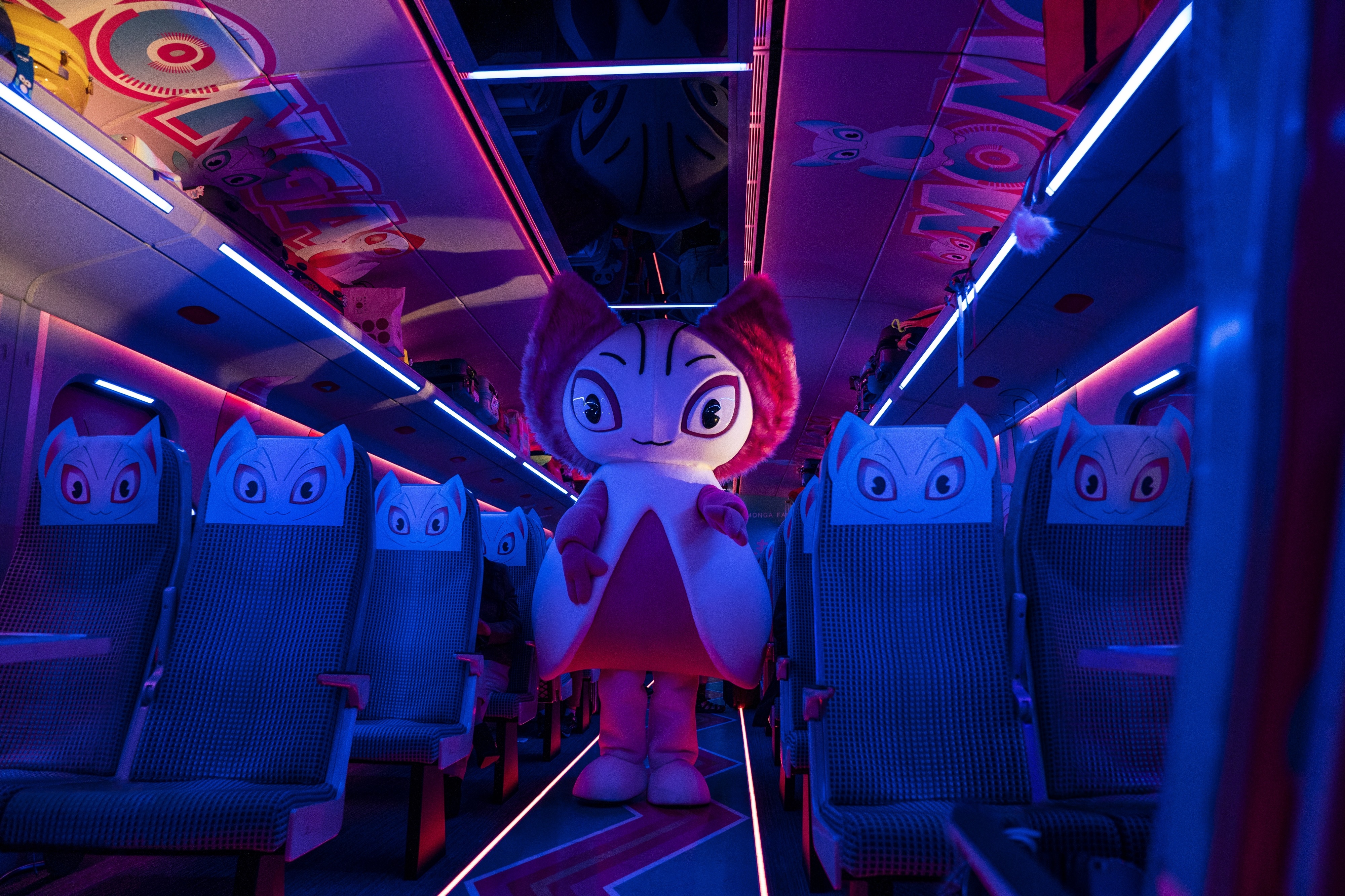 Character in a decorated train carriage HD Wallpaper