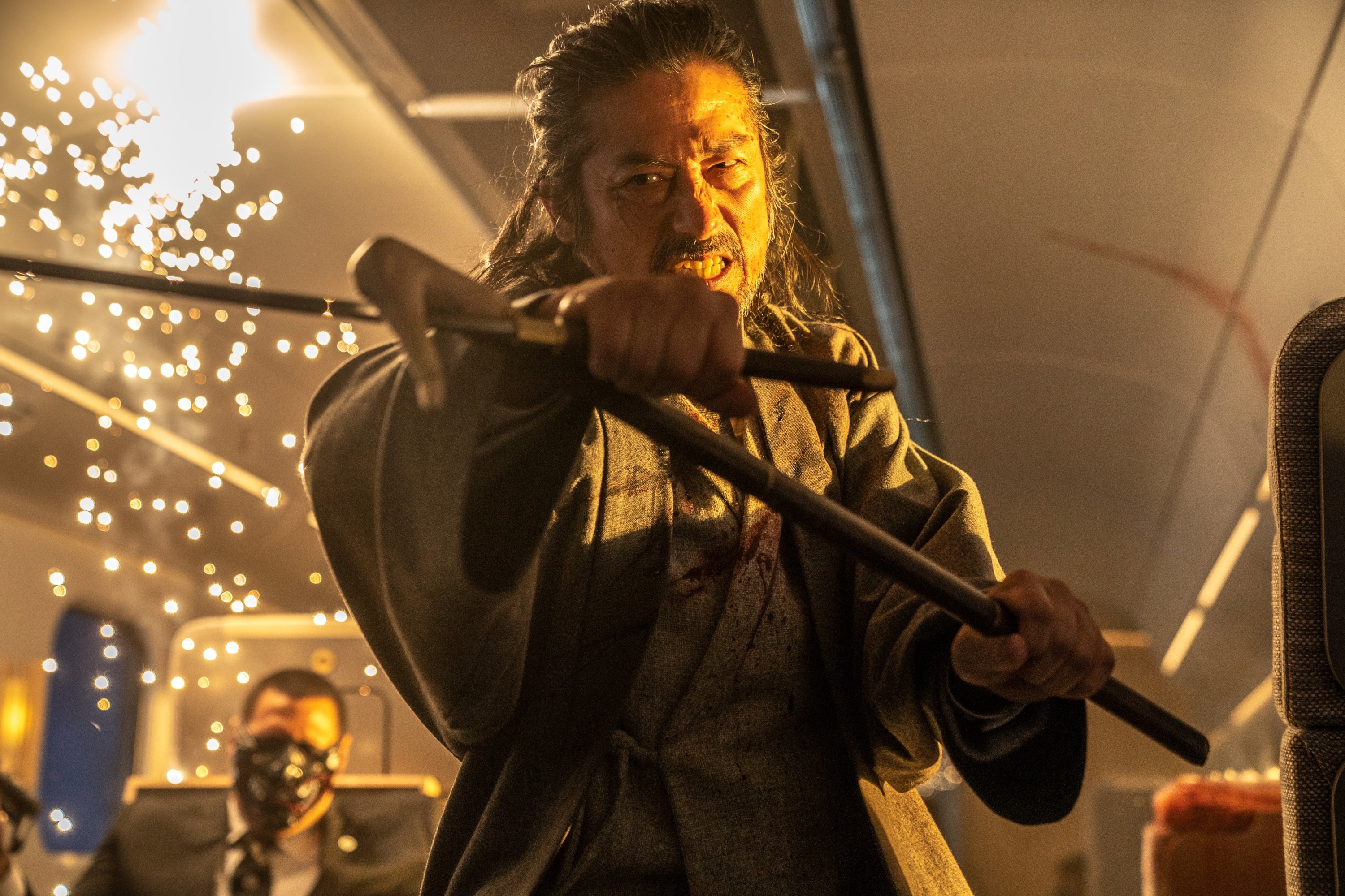 Man with nunchucks on Bullet Train HD Wallpaper