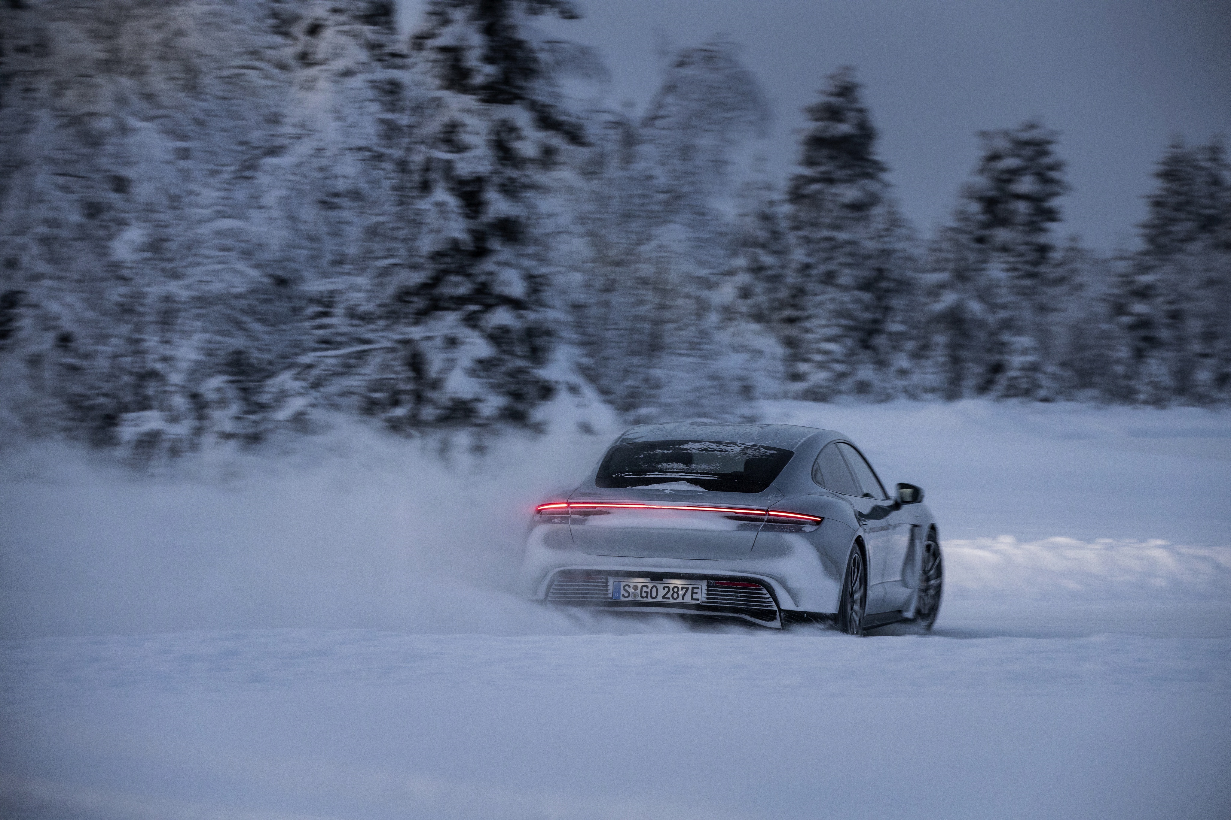 Porsche Taycan 4S drifting in winter HD Wallpaper