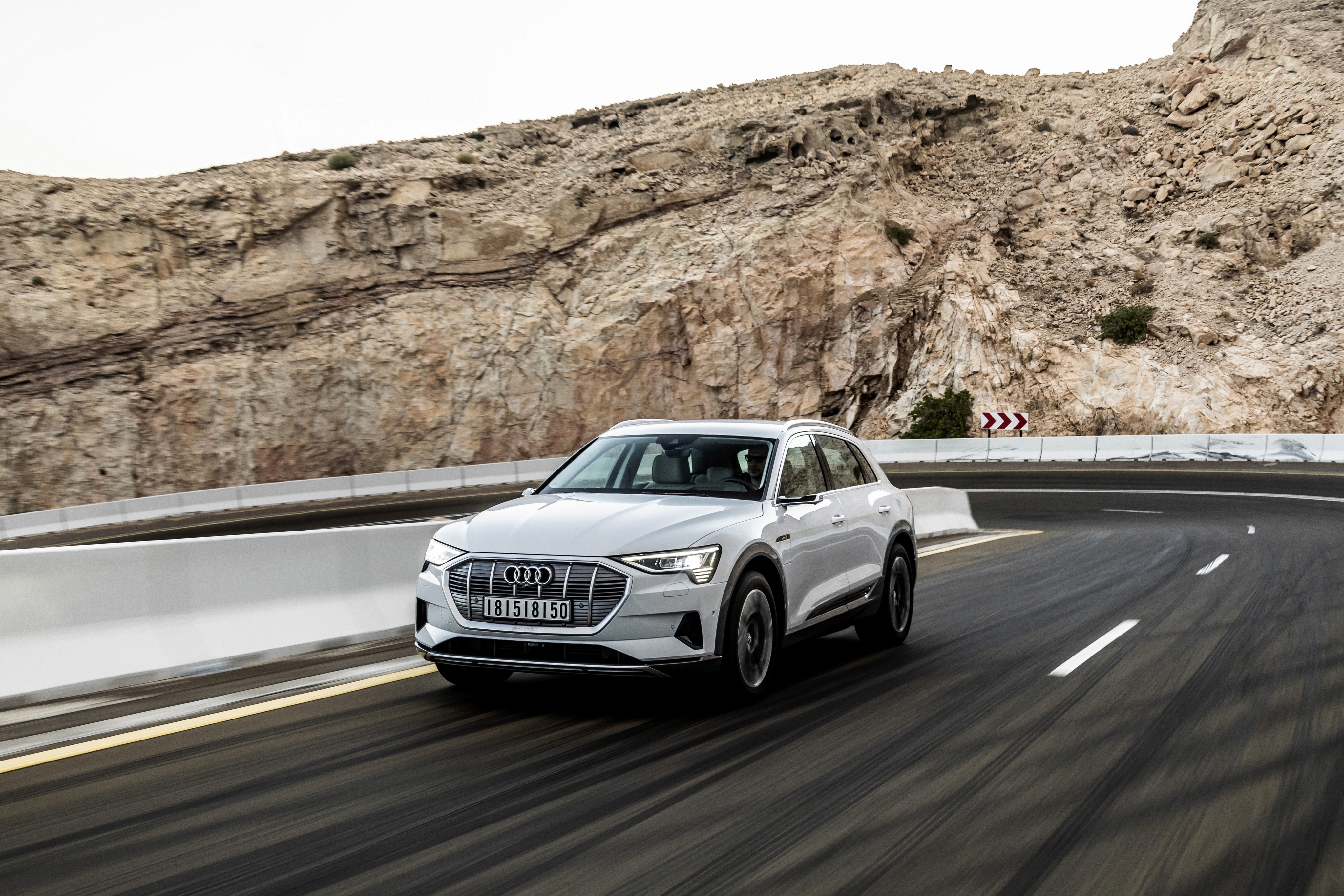 White Audi E-Tron SUV on a Mountain Road HD Wallpaper