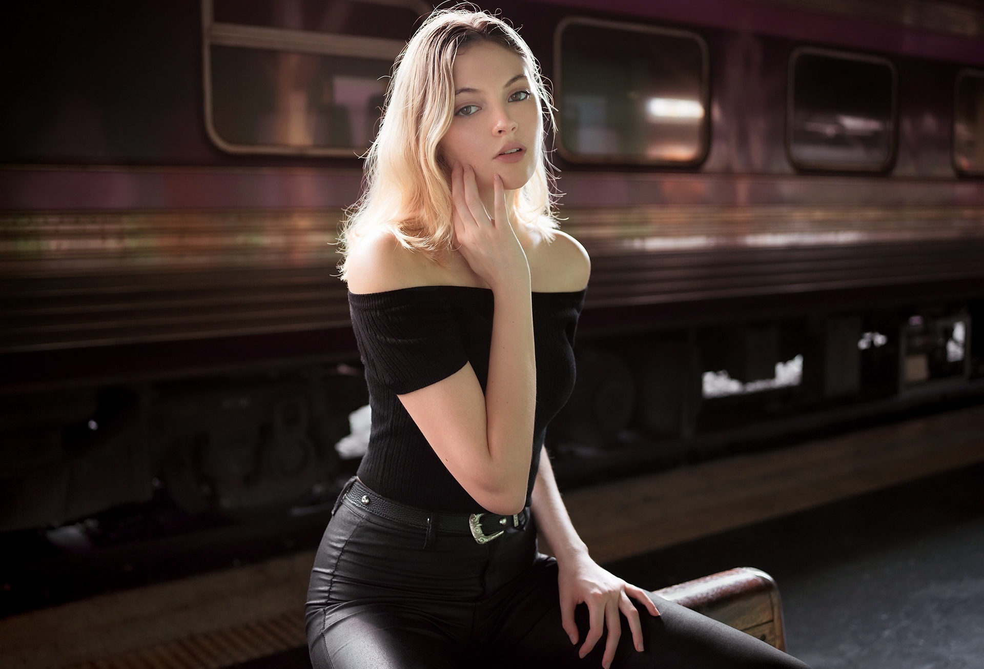 Model posing by a train HD Wallpaper