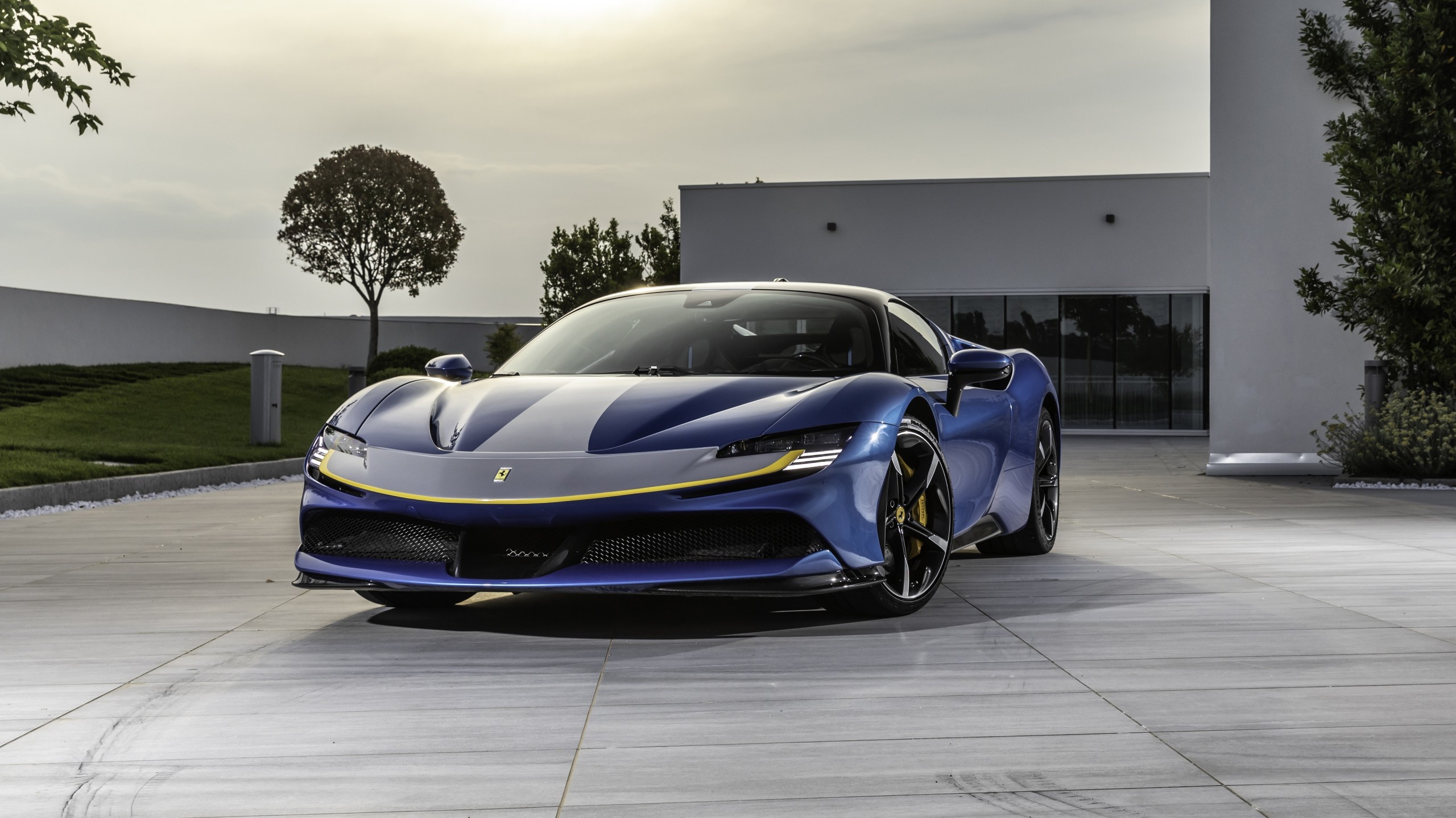 Blue Ferrari SF90 Stradale with yellow accents HD Wallpaper