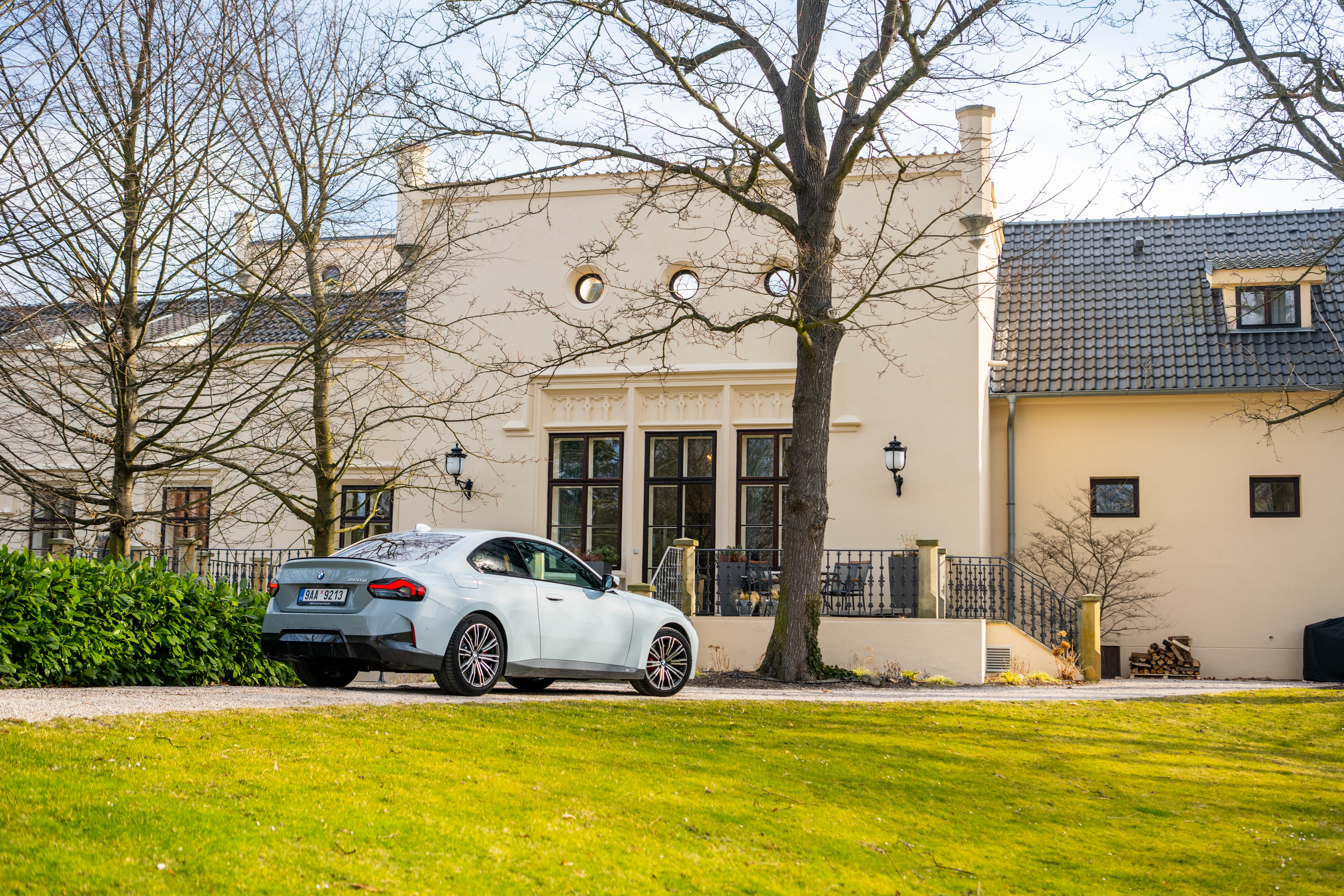 BMW 220d Coupé M Sport parked near a building HD Wallpaper