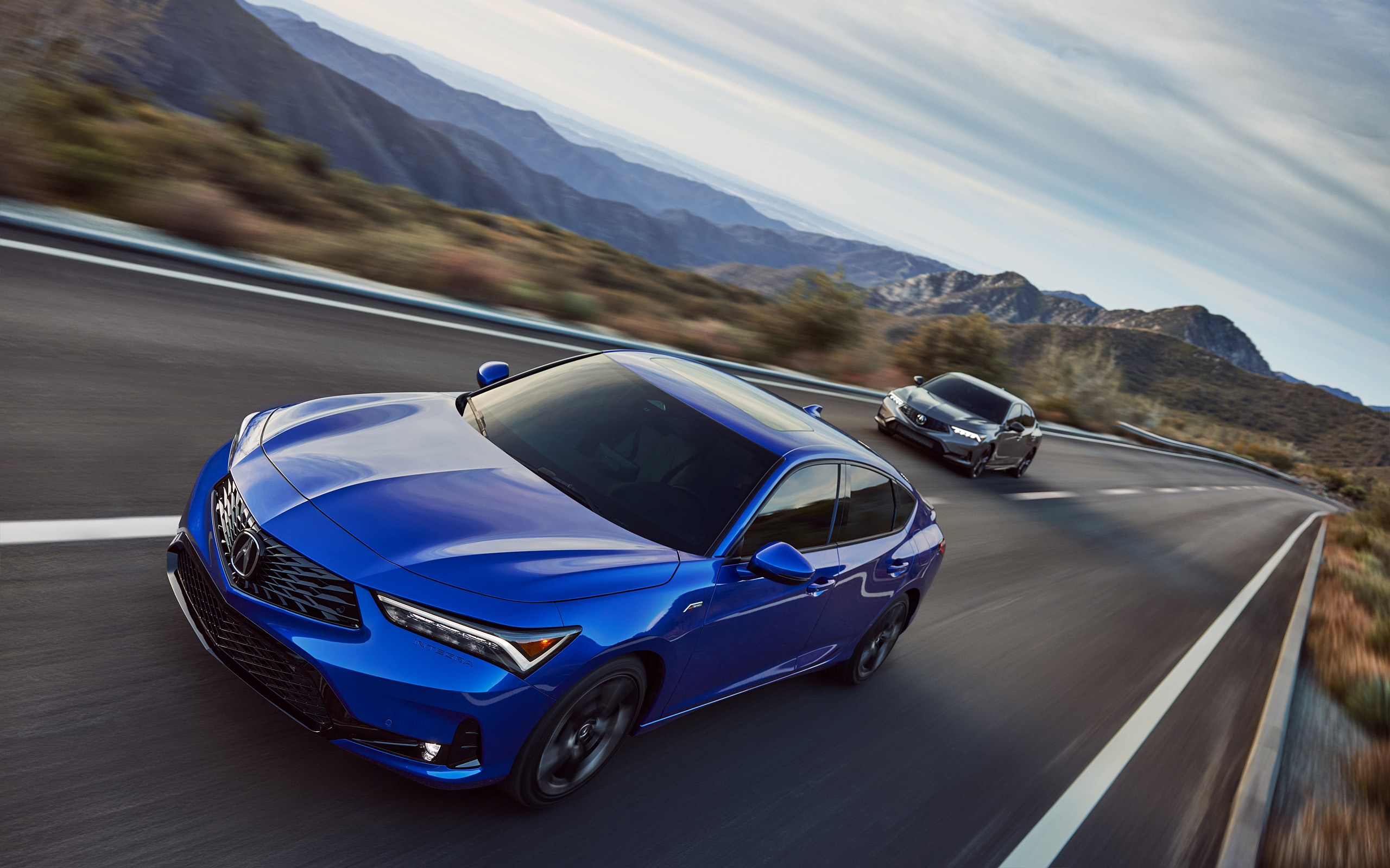 Acura Integra cars driving on a mountain road HD Wallpaper
