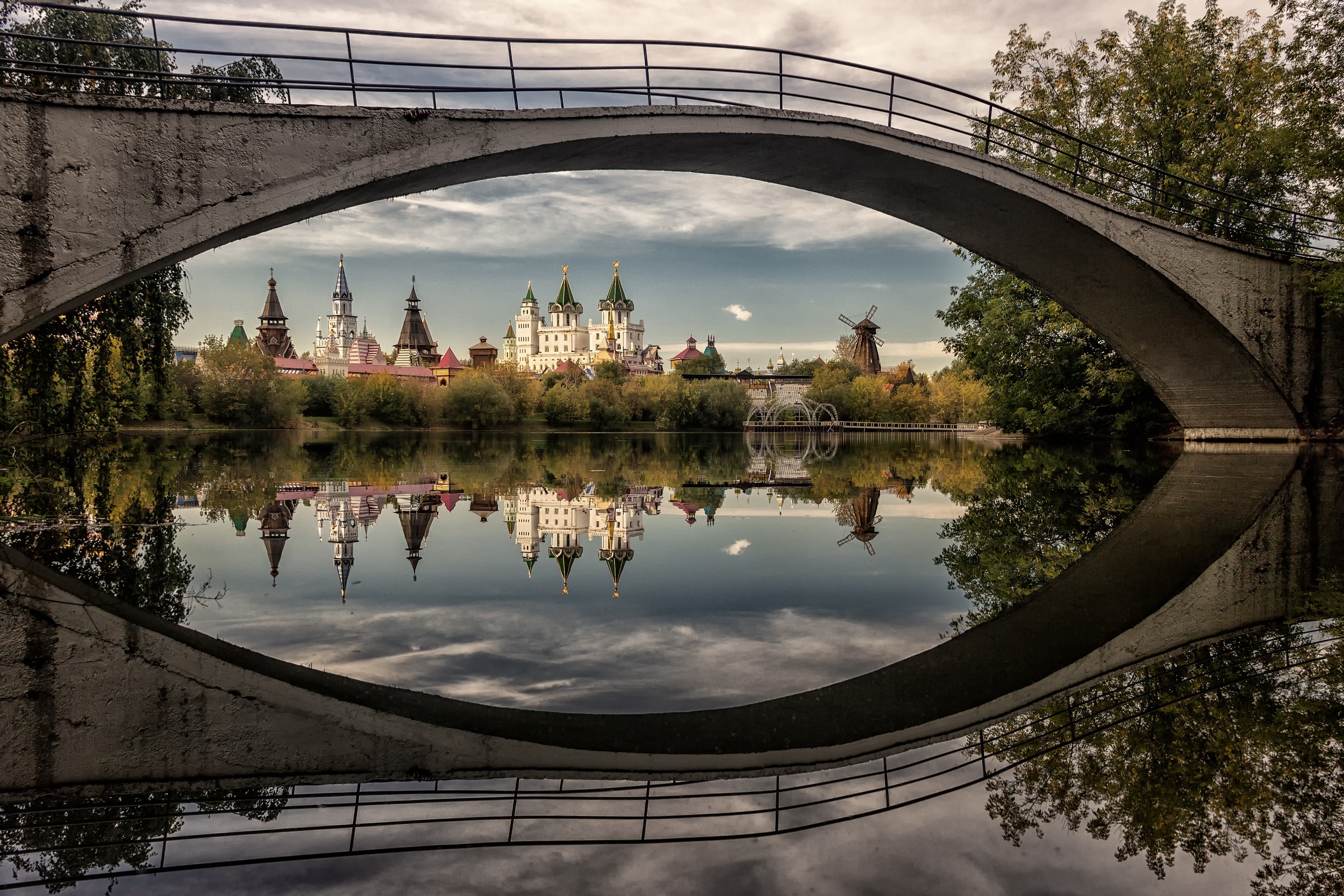 Izmaylovo Kremlin reflected in water under a bridge in Russia HD Wallpaper