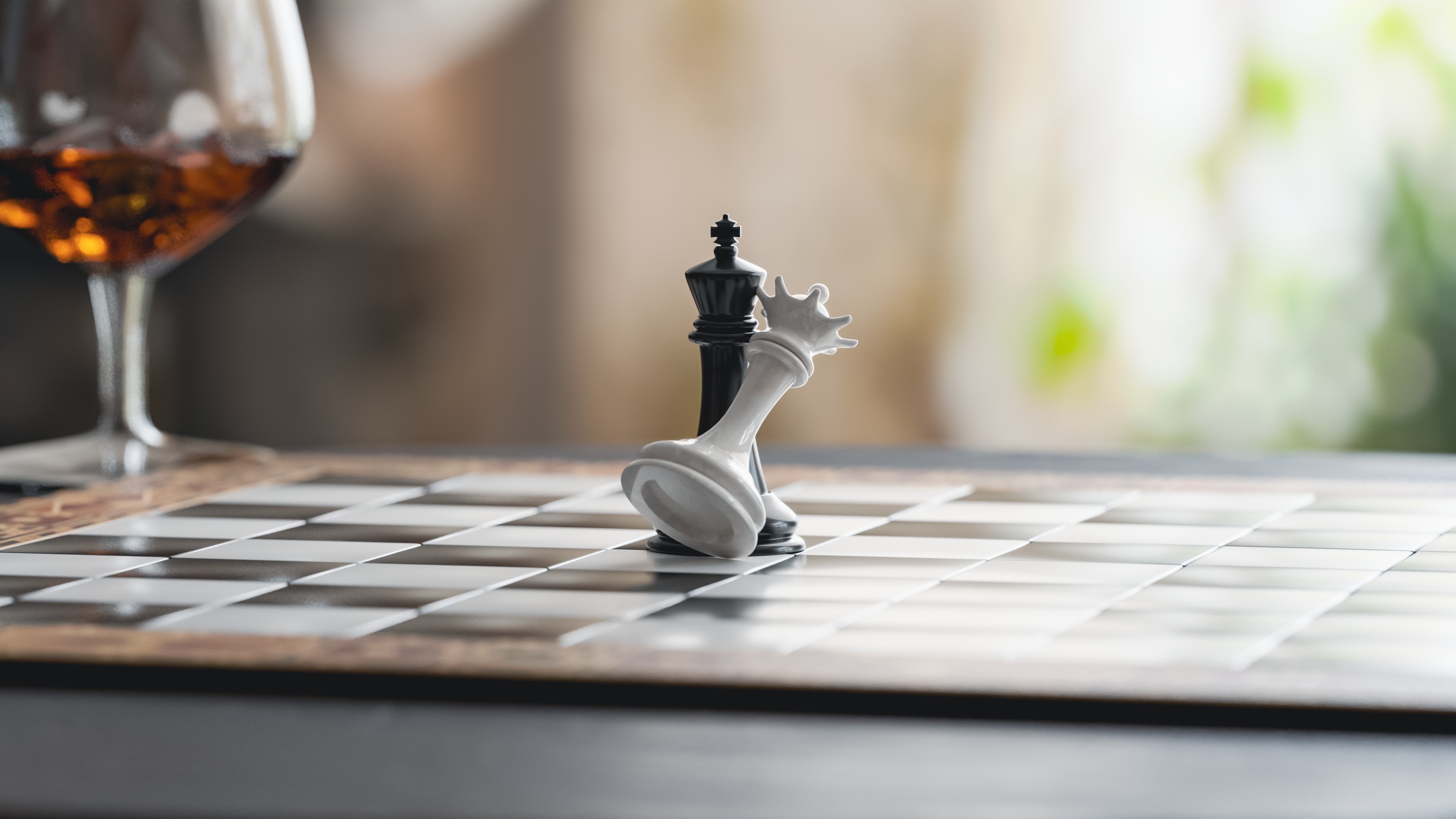 Chess pieces on a chessboard HD Wallpaper