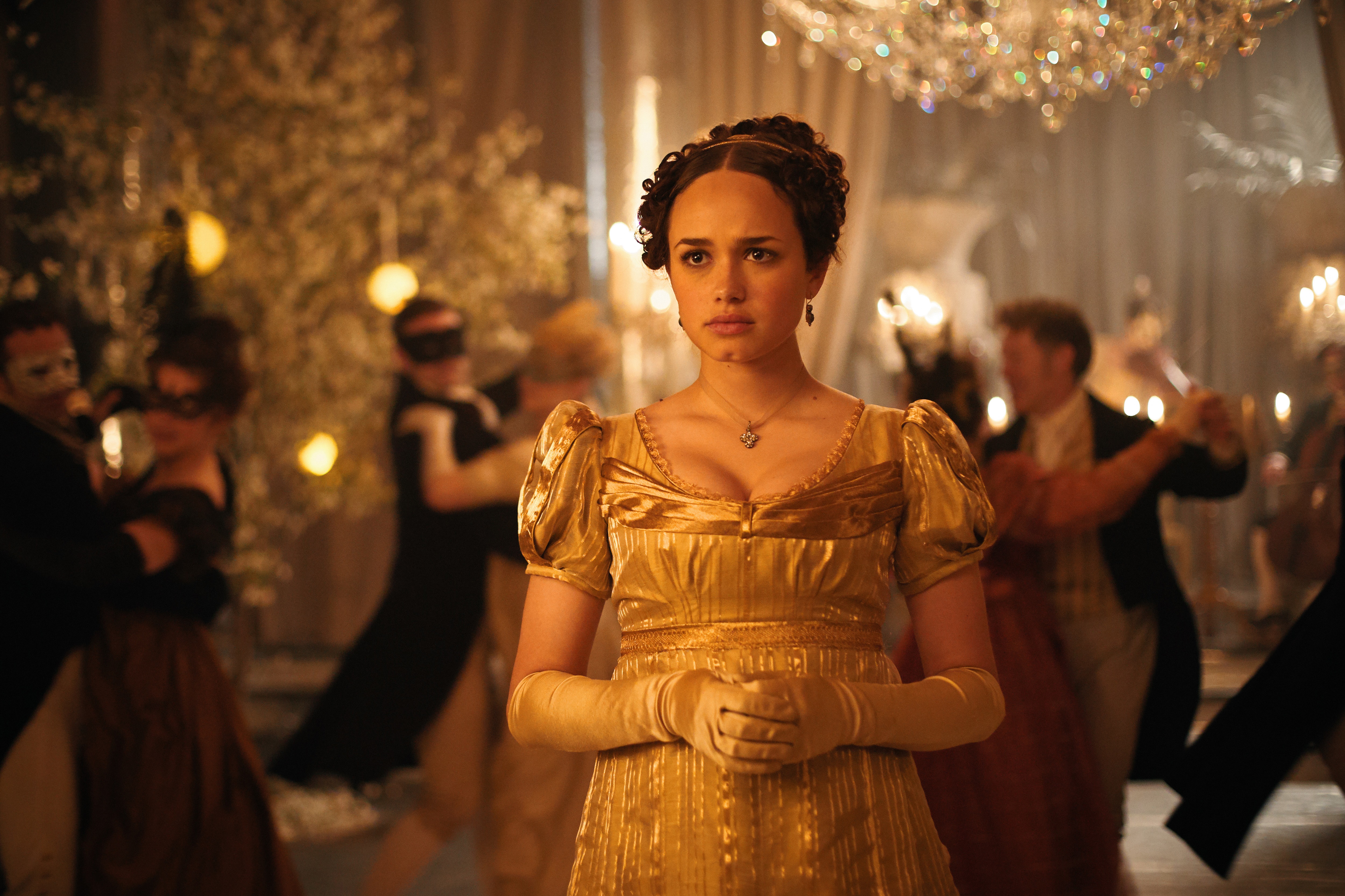 Woman in gold dress at a ball HD Wallpaper