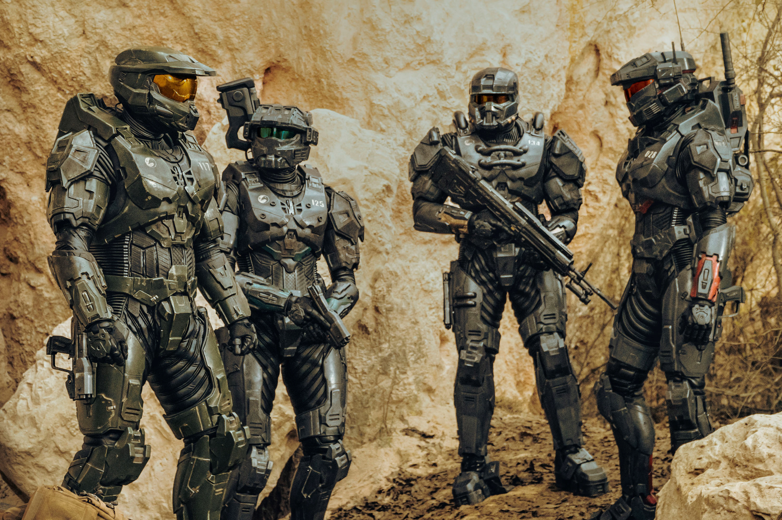 Four Spartans from Halo in a rocky landscape HD Wallpaper