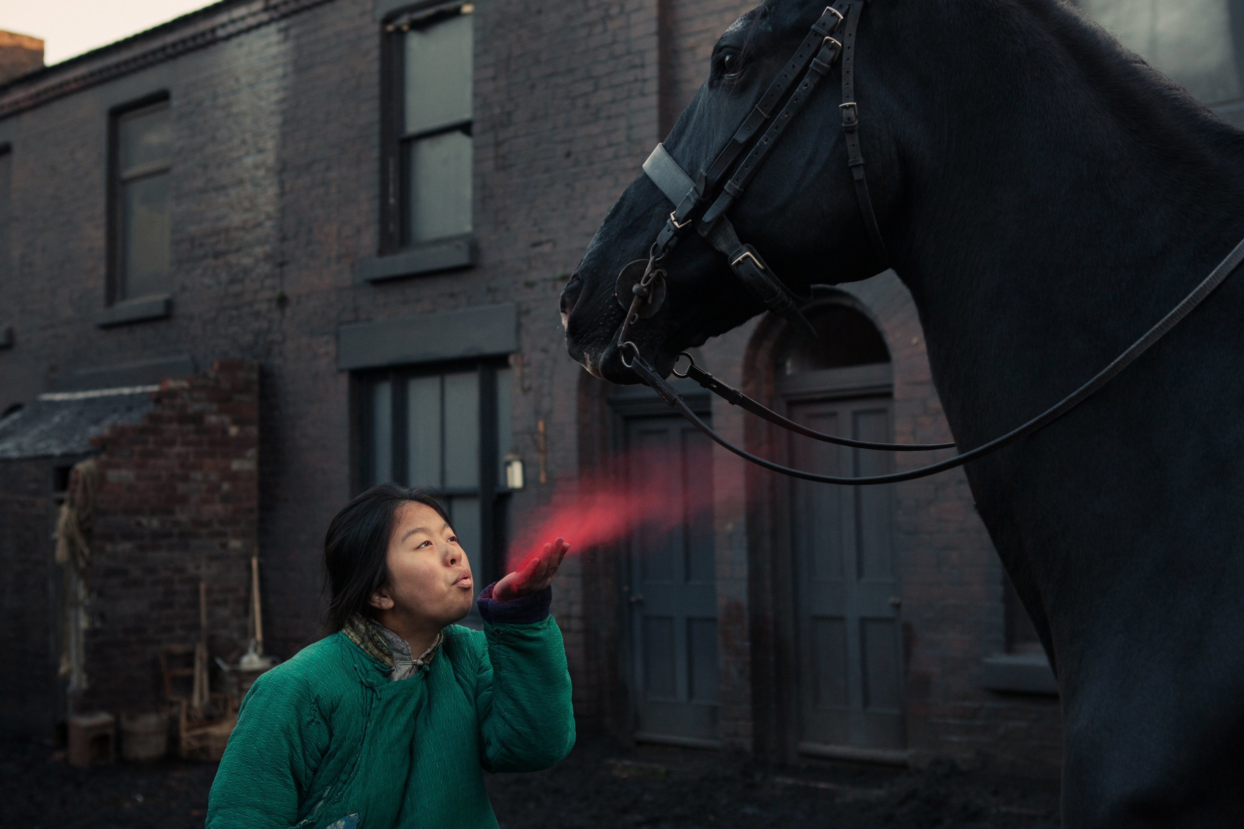 Girl blowing red powder at a horse in Peaky Blinders 4K HD Wallpaper
