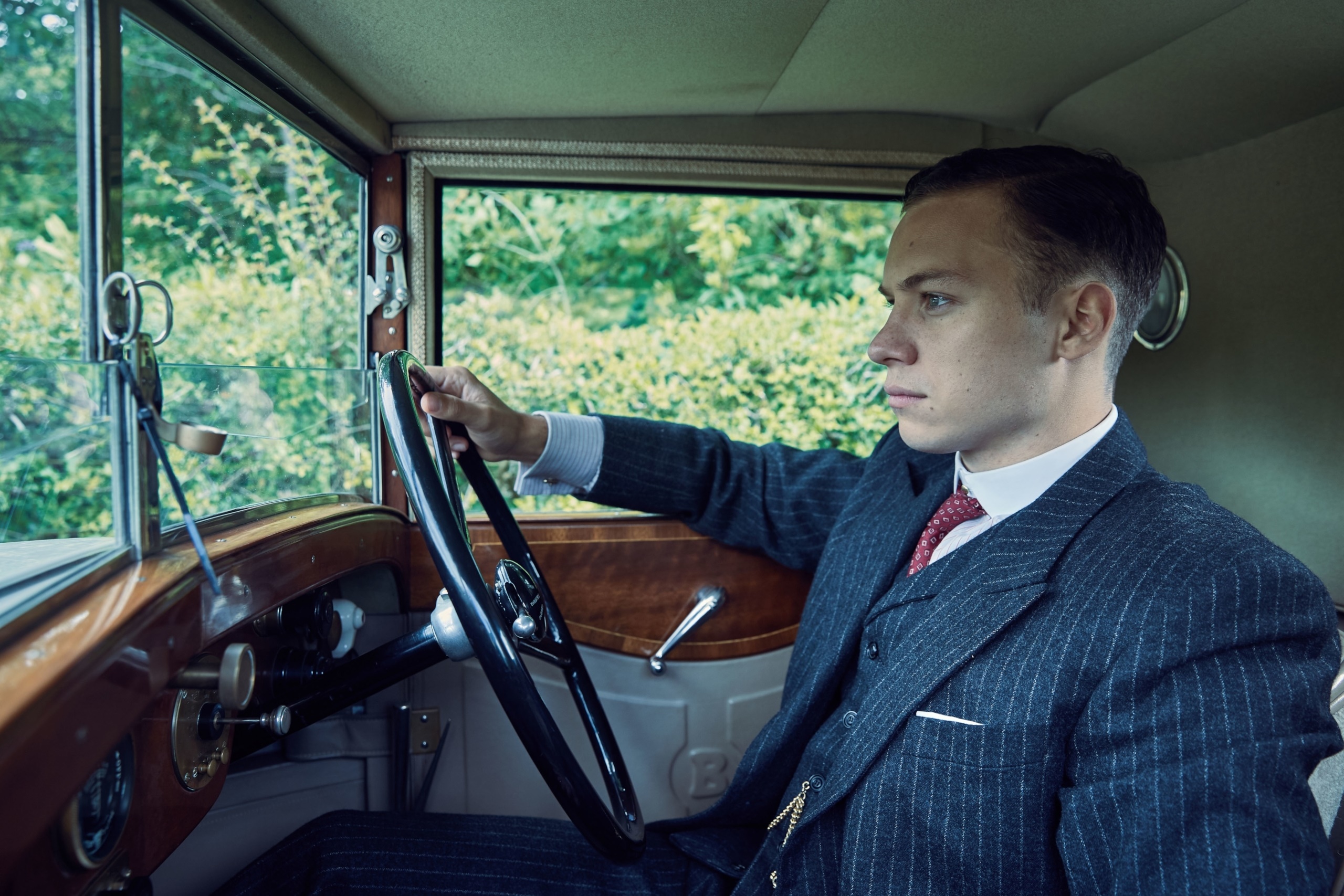 Arthur Shelby from Peaky Blinders driving a car HD Wallpaper