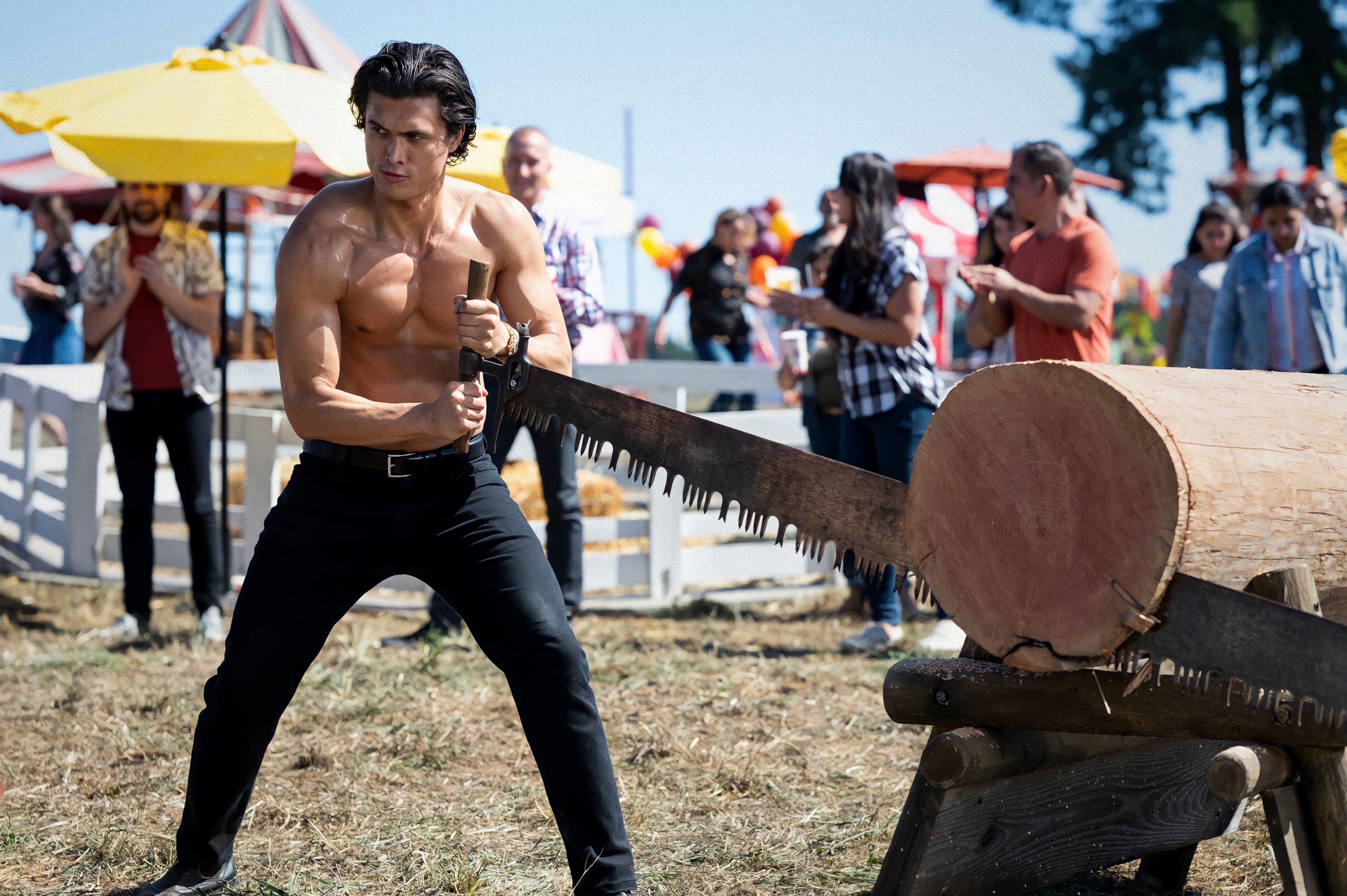 Jughead Jones from Riverdale sawing a log HD Wallpaper