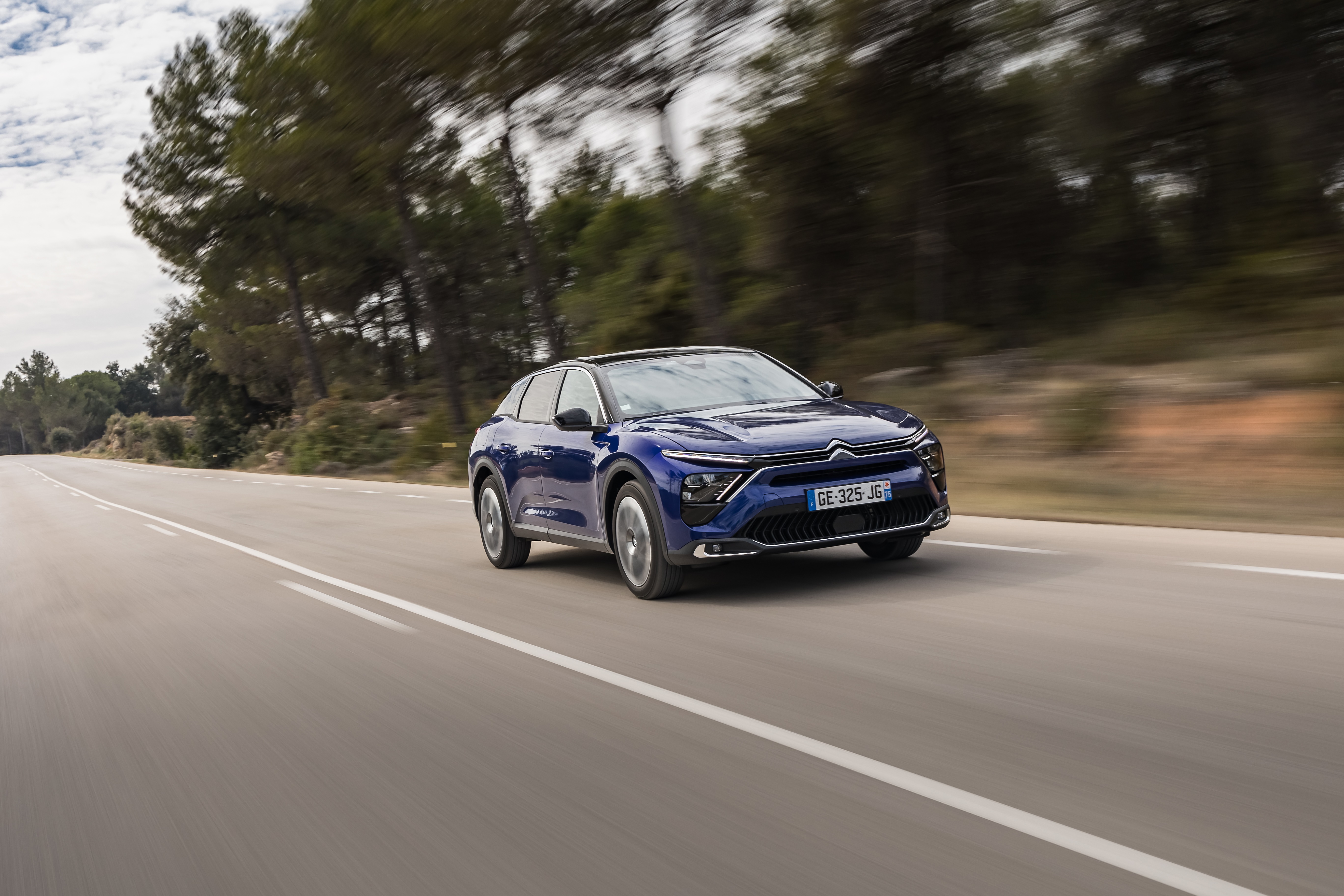 Blue Citroën C5 X 4K driving on a road HD Wallpaper