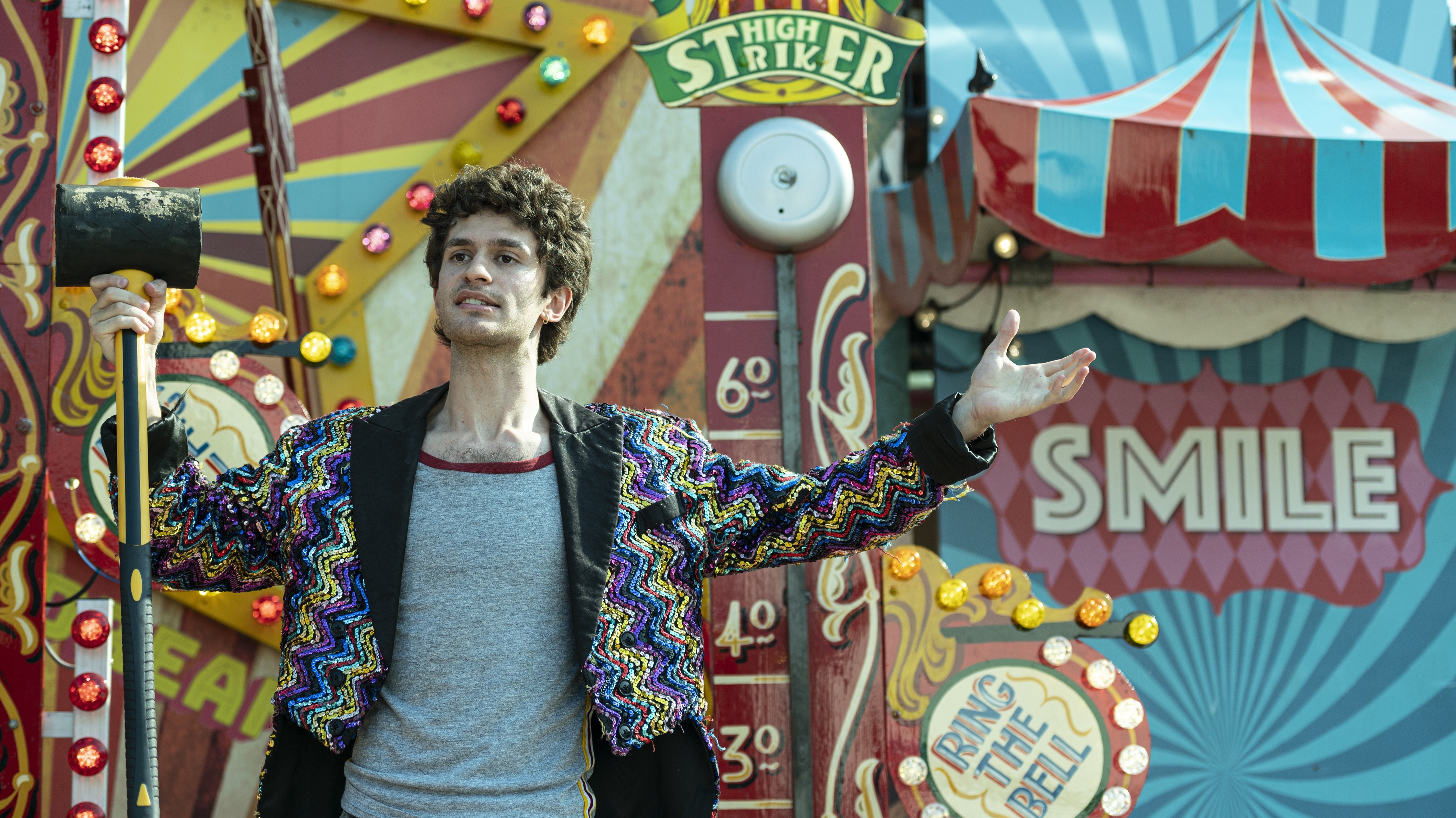 Man with hammer at carnival game HD Wallpaper