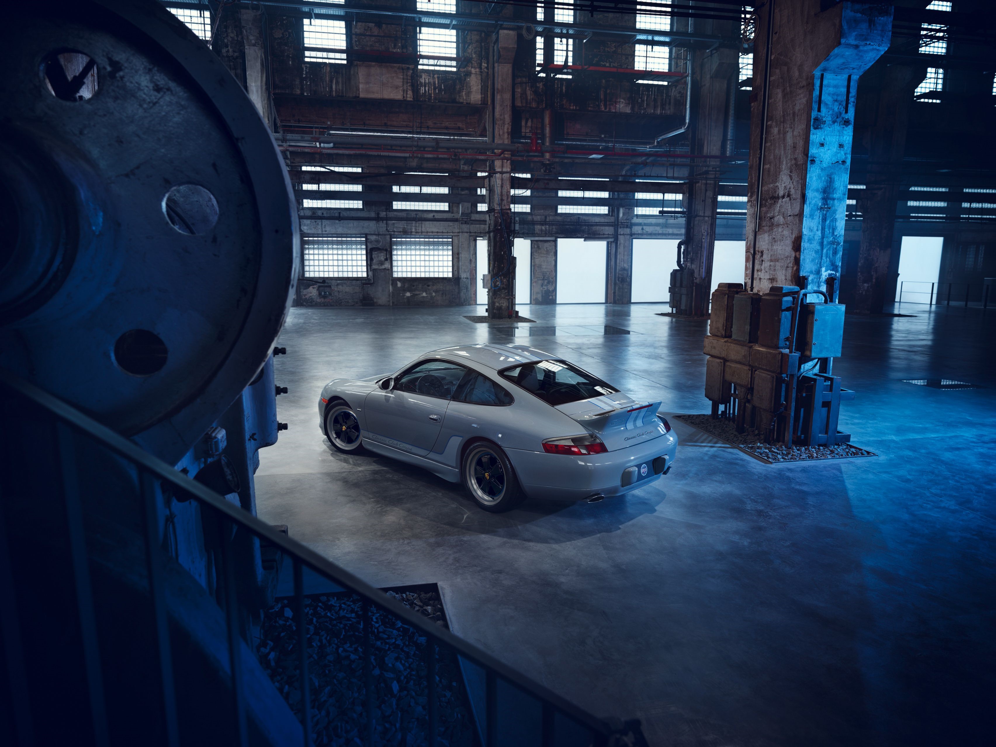 Porsche 911 Carrera in industrial warehouse HD Wallpaper