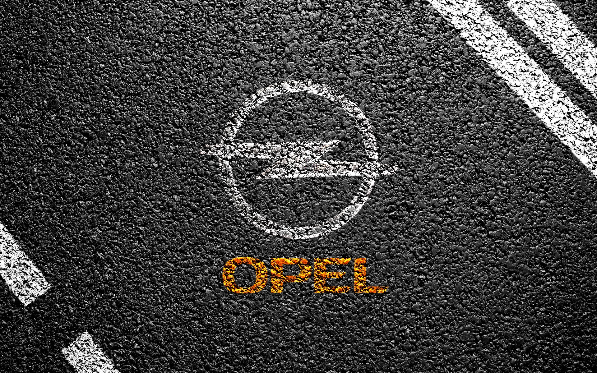 Opel logo on asphalt road HD Wallpaper