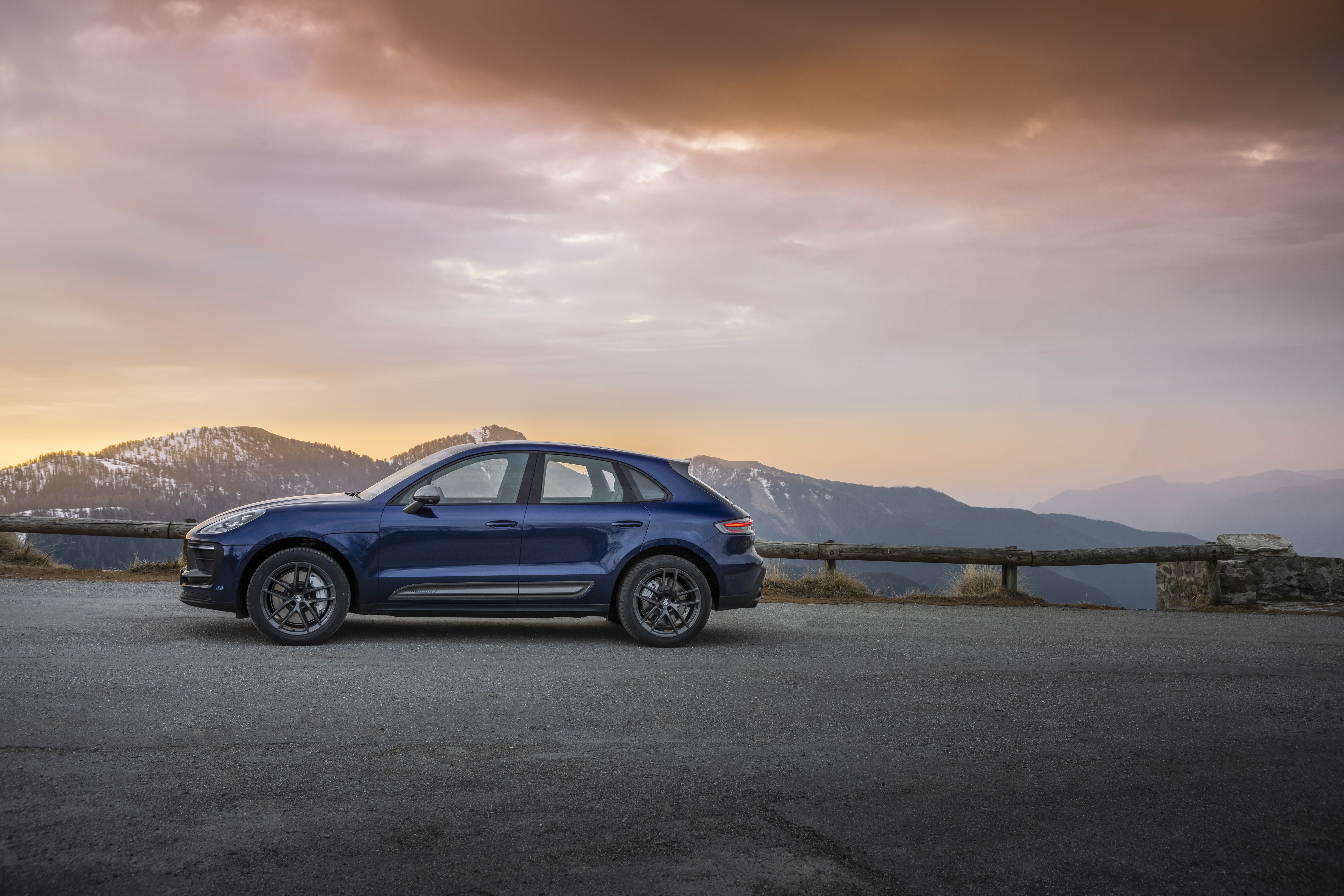 Blue Porsche Macan Turbo on mountain road HD Wallpaper