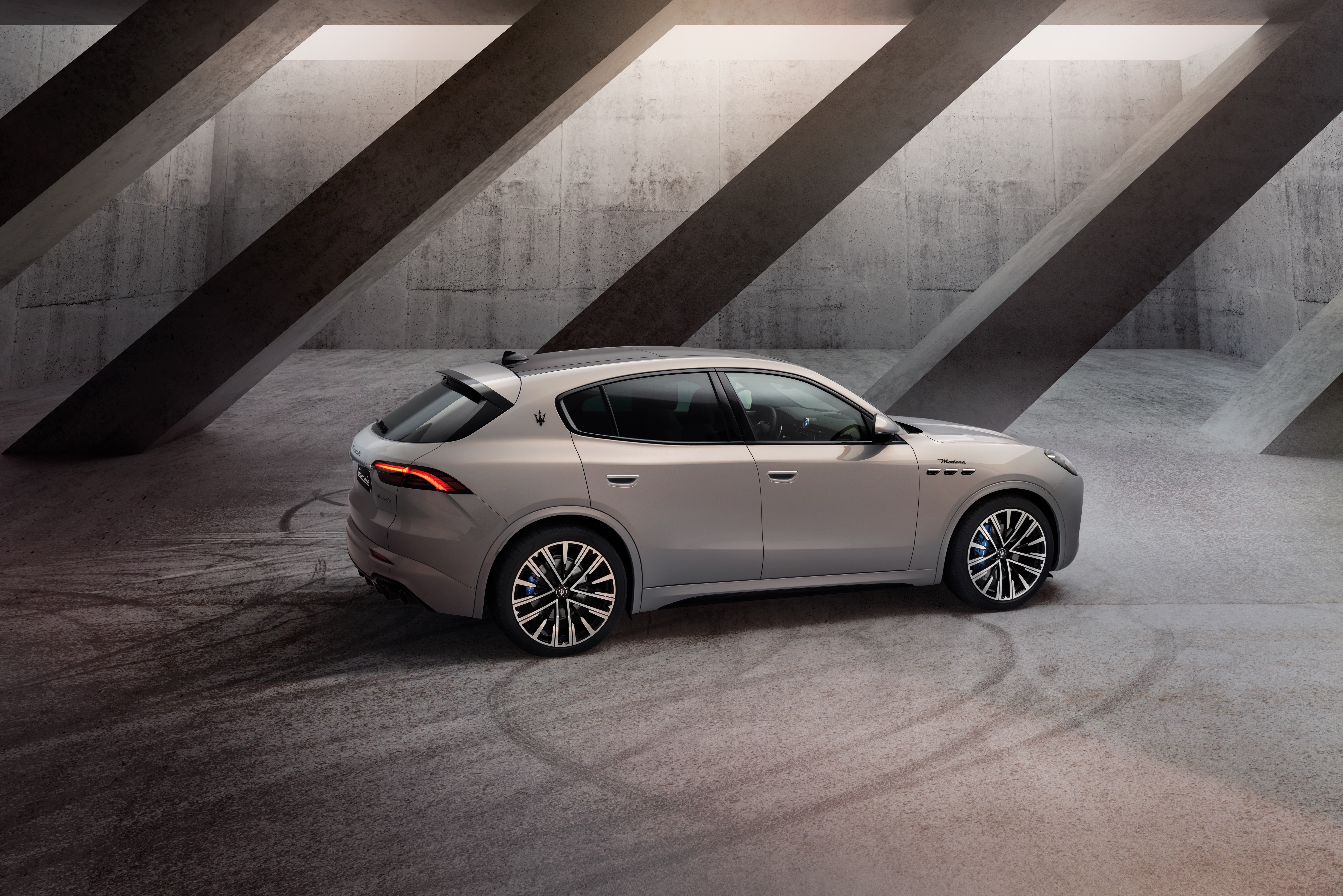 Maserati Grecale Modena in concrete structure HD Wallpaper