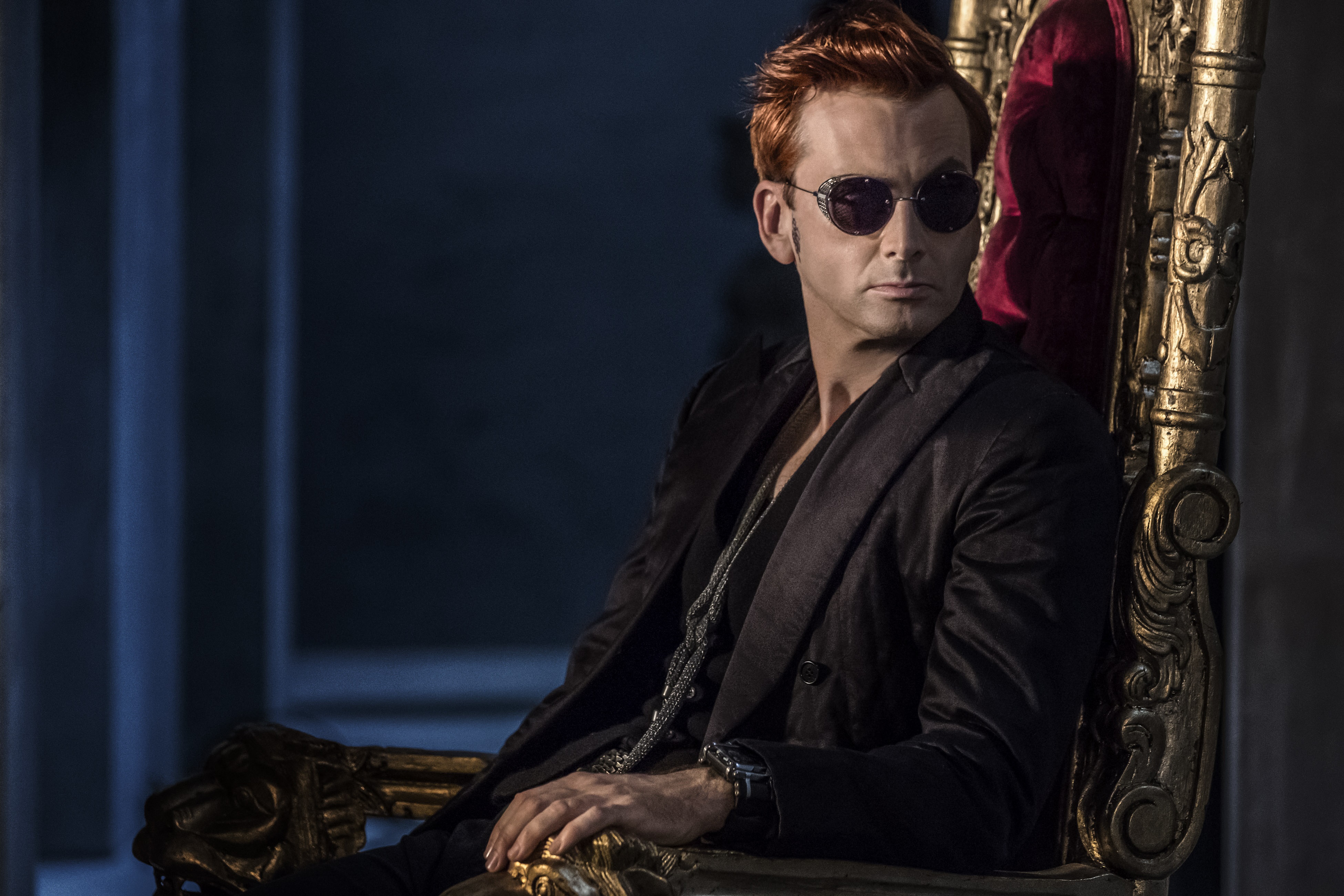 Crowley from Good Omens sitting on a throne HD Wallpaper