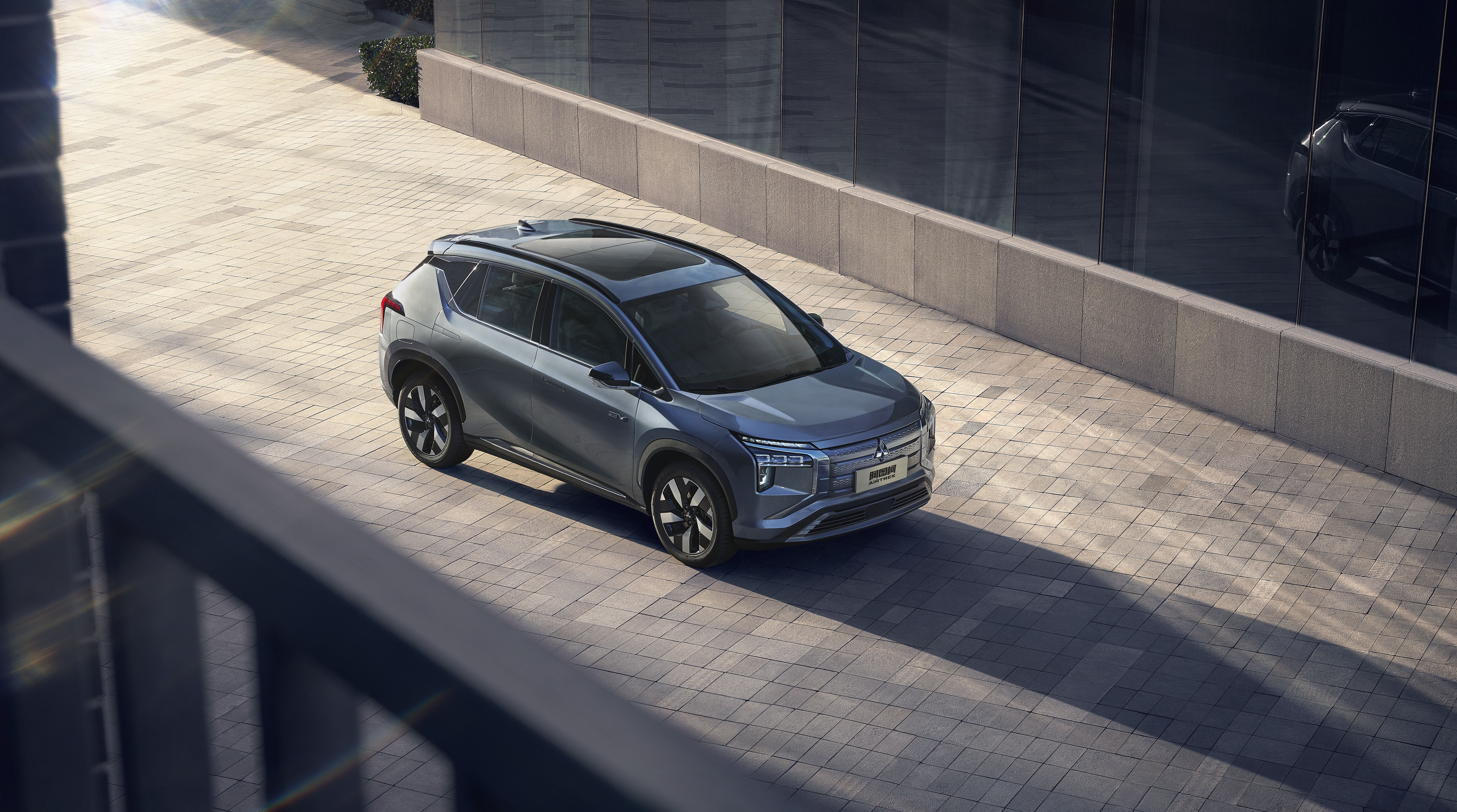 Mitsubishi Airtrek electric SUV parked on paved area HD Wallpaper