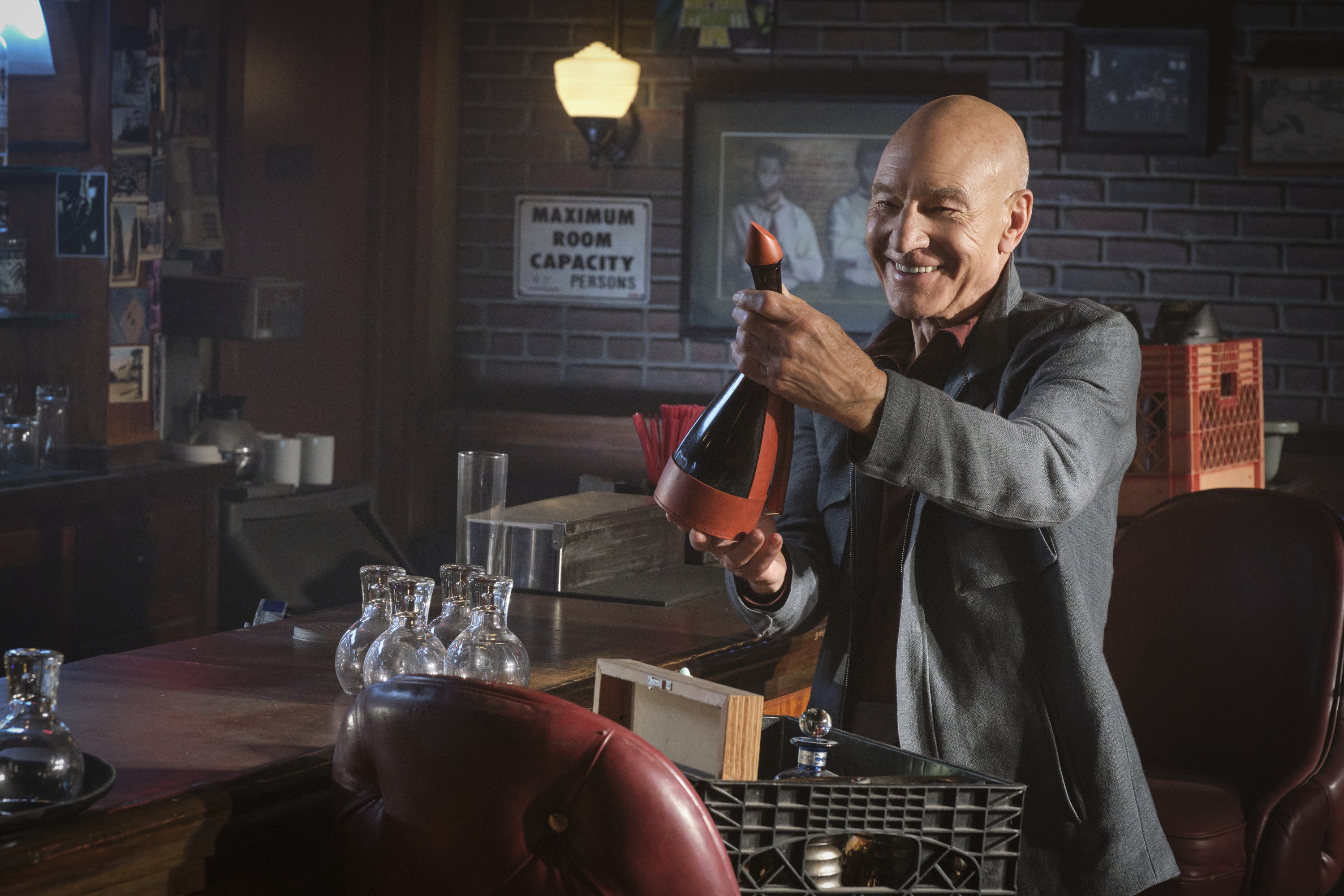 Jean-Luc Picard from Star Trek: Picard holding a bottle HD Wallpaper