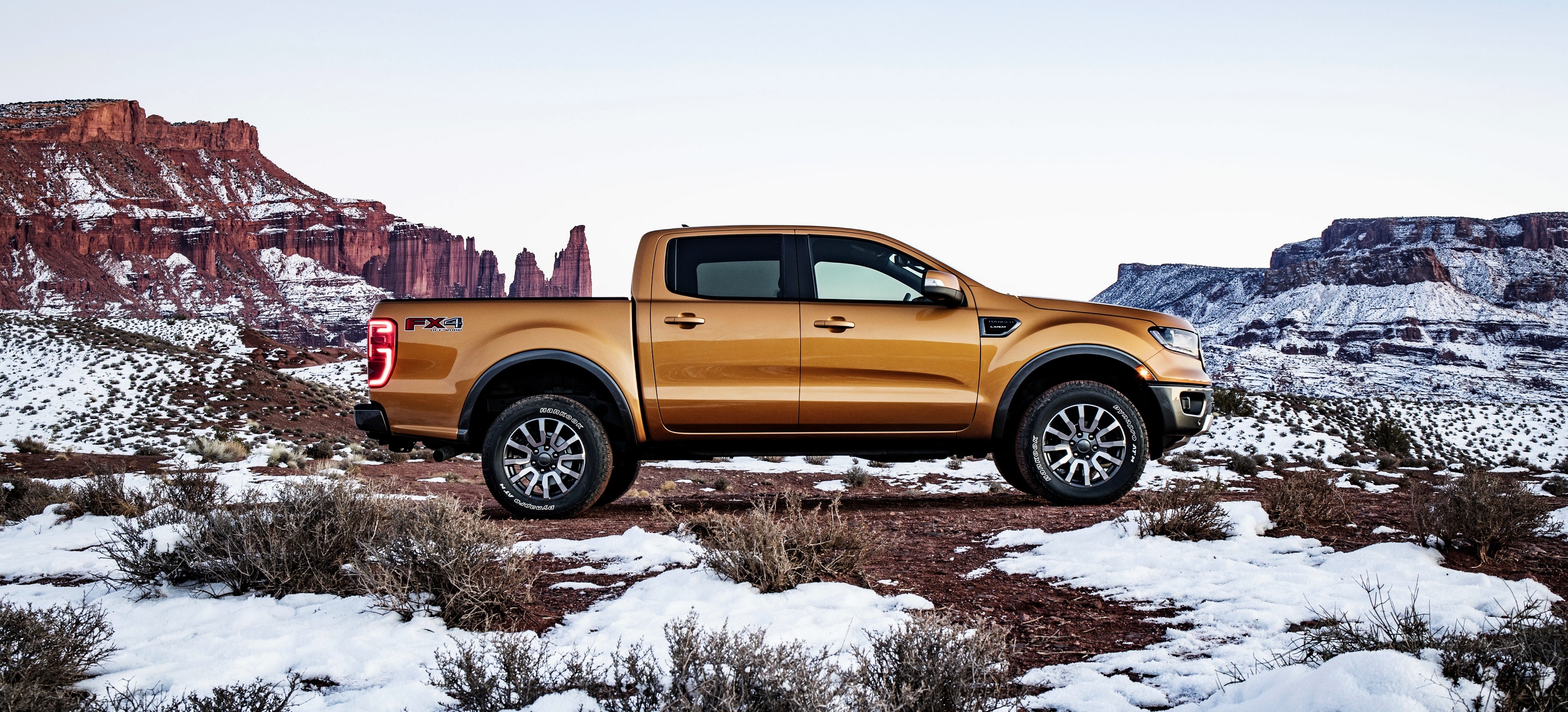 Ford Ranger FX4 pickup truck in snowy desert landscape HD Wallpaper