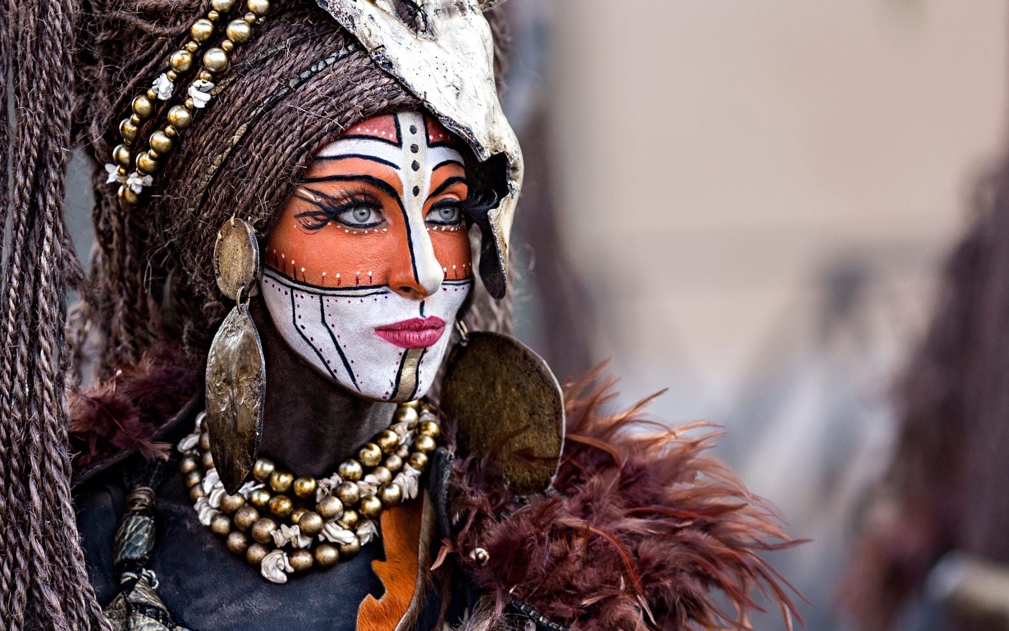 Woman with face paint and tribal attire HD Wallpaper