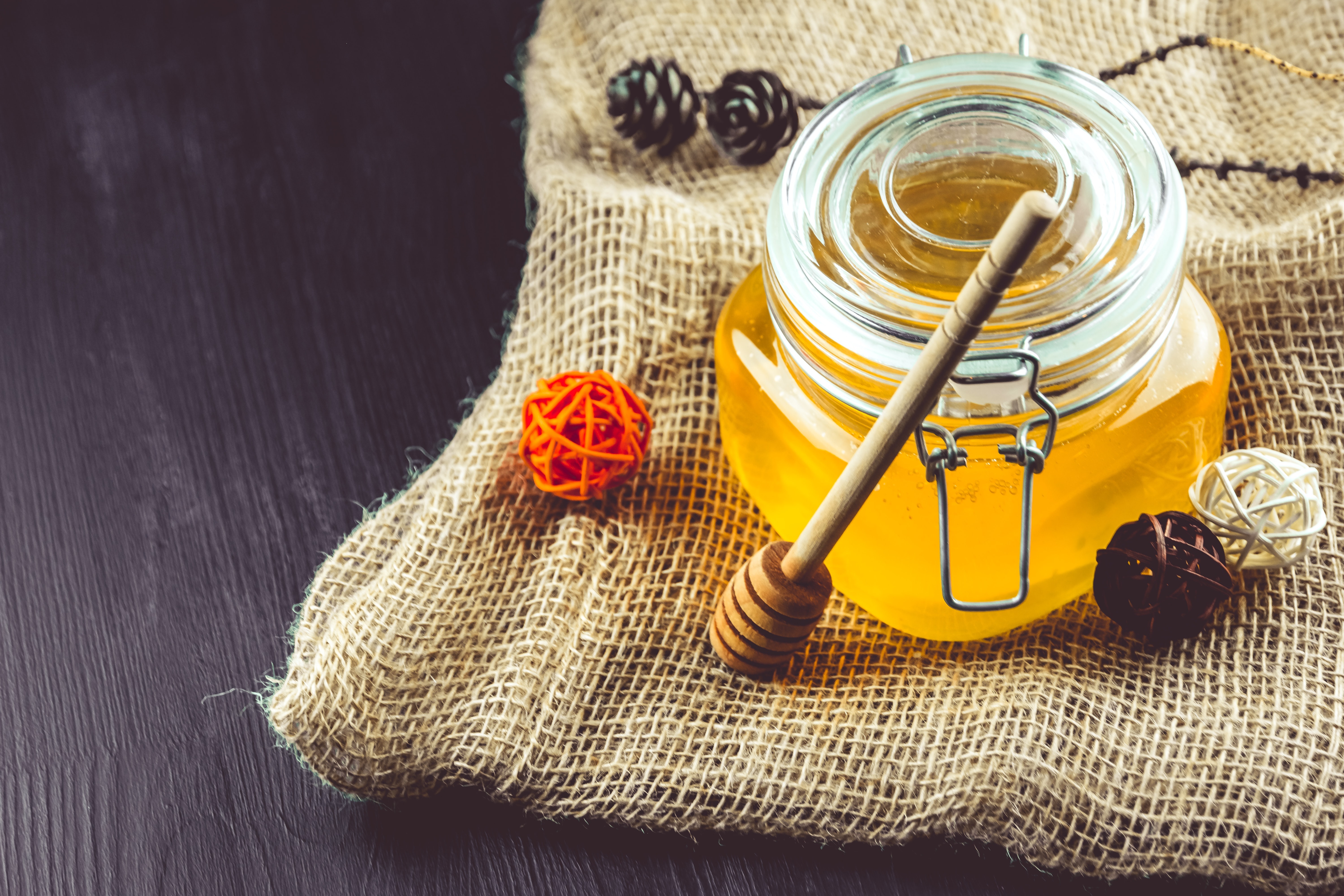 Jar of Honey with Dipper on Burlap HD Wallpaper