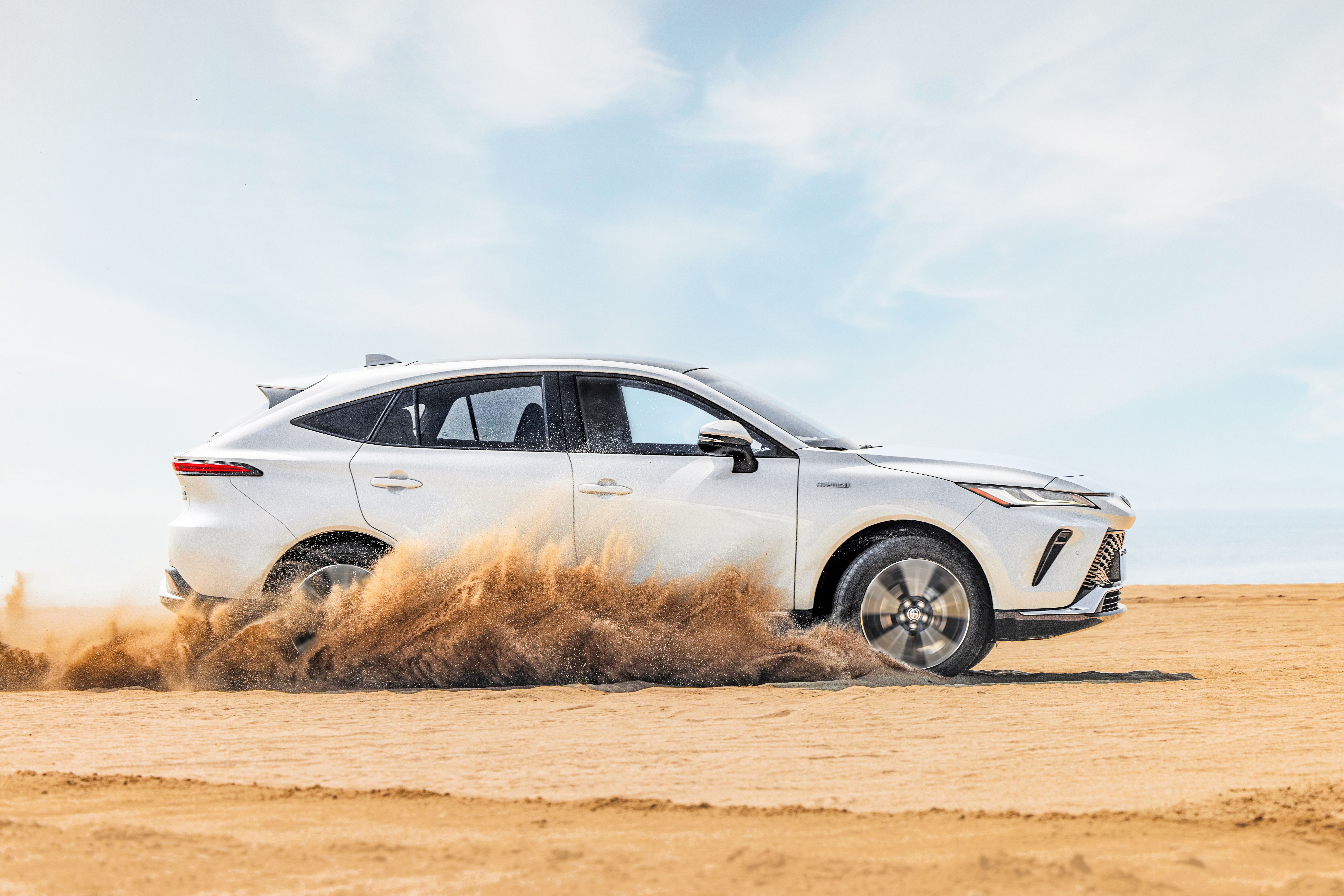 White Toyota Venza Hybrid driving on sand HD Wallpaper