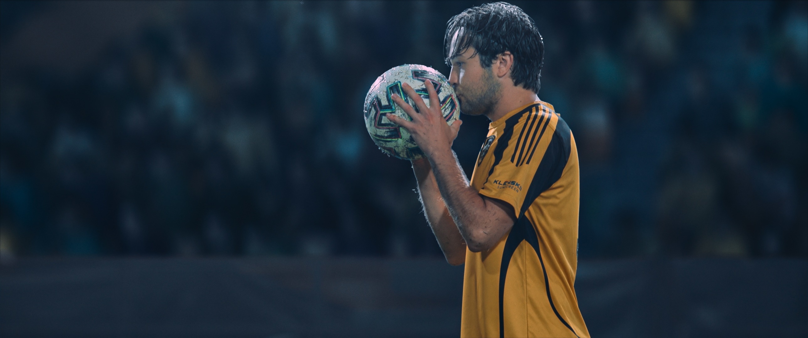 Taylor Gray kissing a soccer ball HD Wallpaper