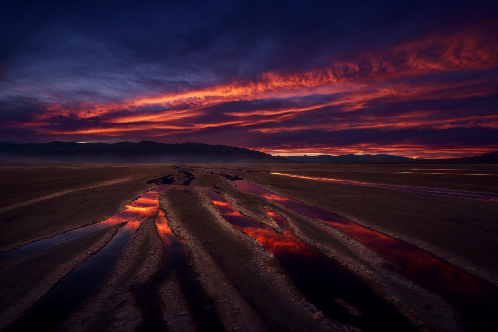 Desert landscape with colorful sunset and water channels HD Wallpaper