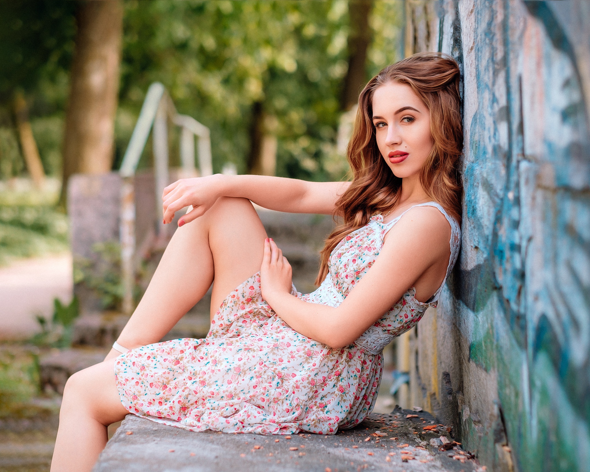 Model posing against graffiti wall HD Wallpaper