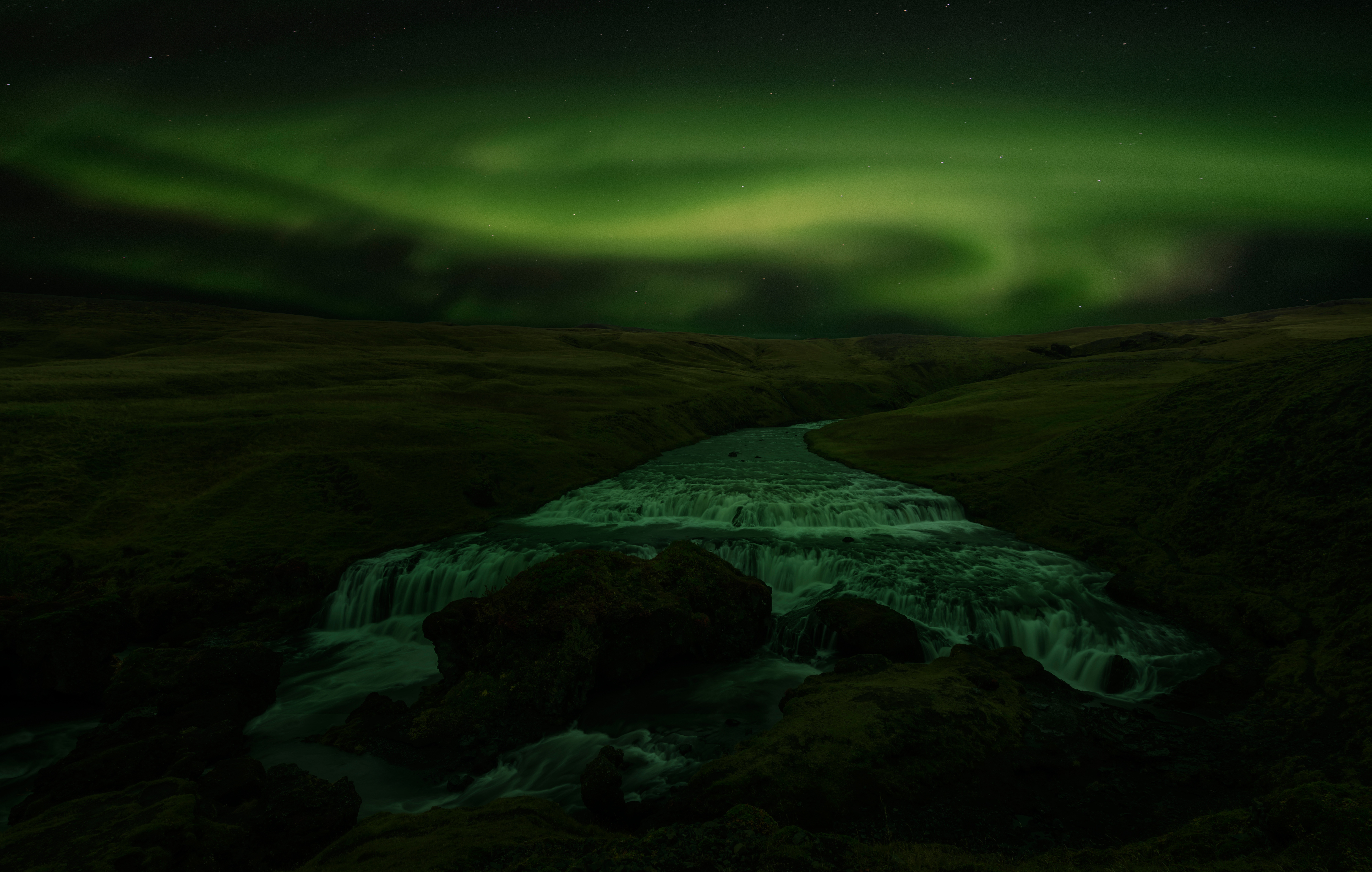 Aurora Borealis over a Waterfall at Night HD Wallpaper