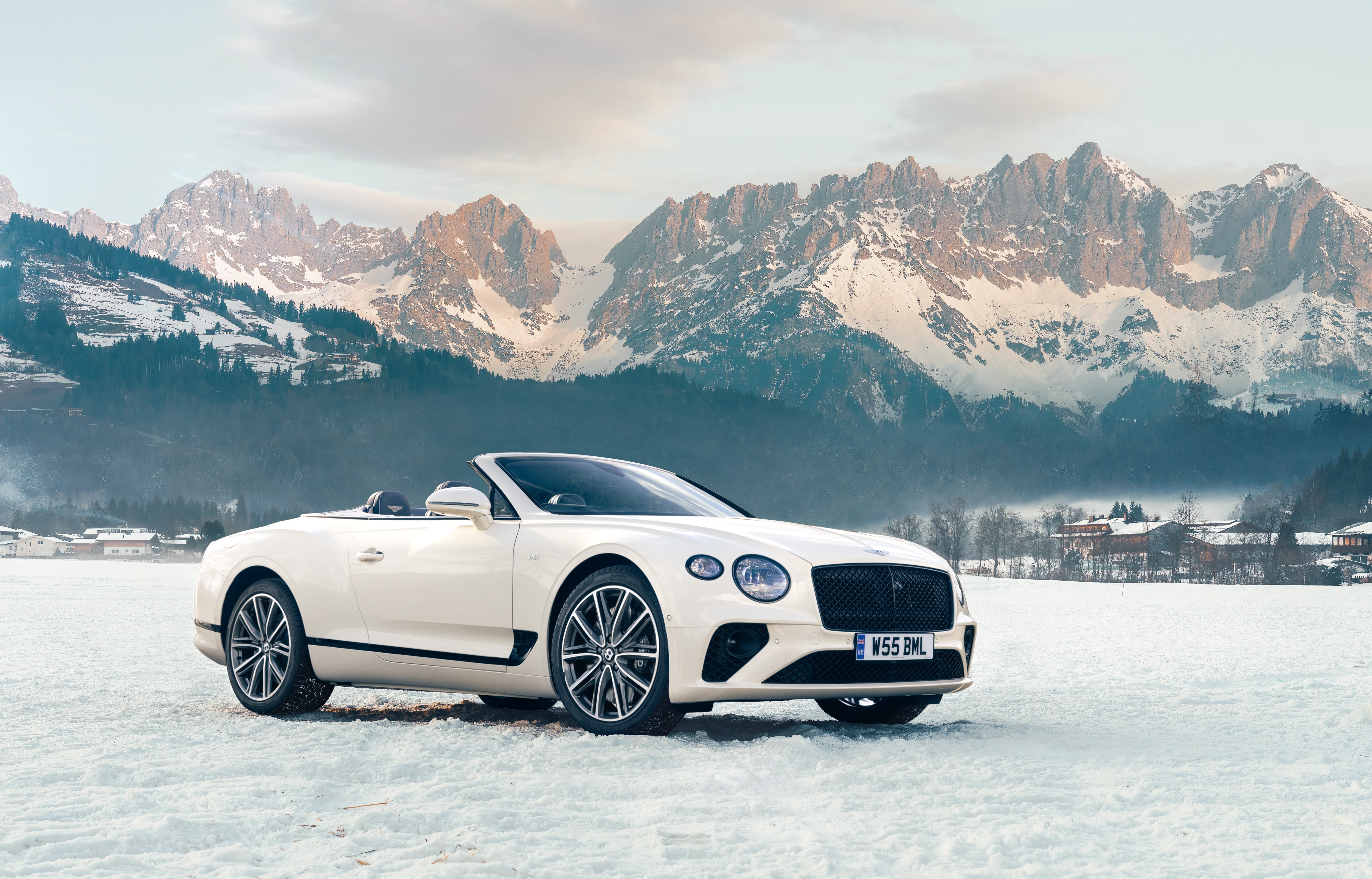 Bentley Continental GT V8 Convertible in snowy mountains 4K HD Wallpaper