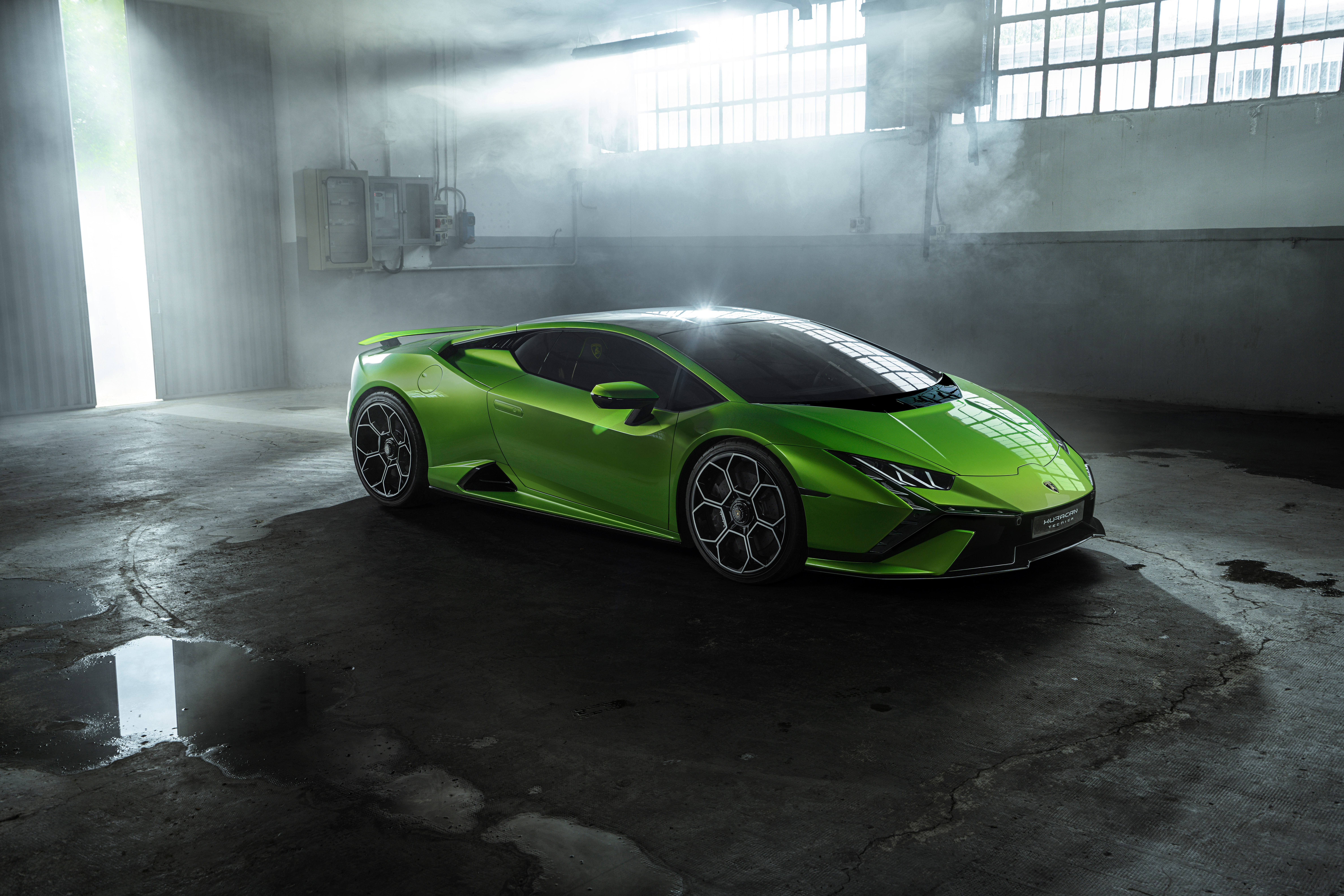 Green Lamborghini Huracán Tecnica in a smoky garage HD Wallpaper