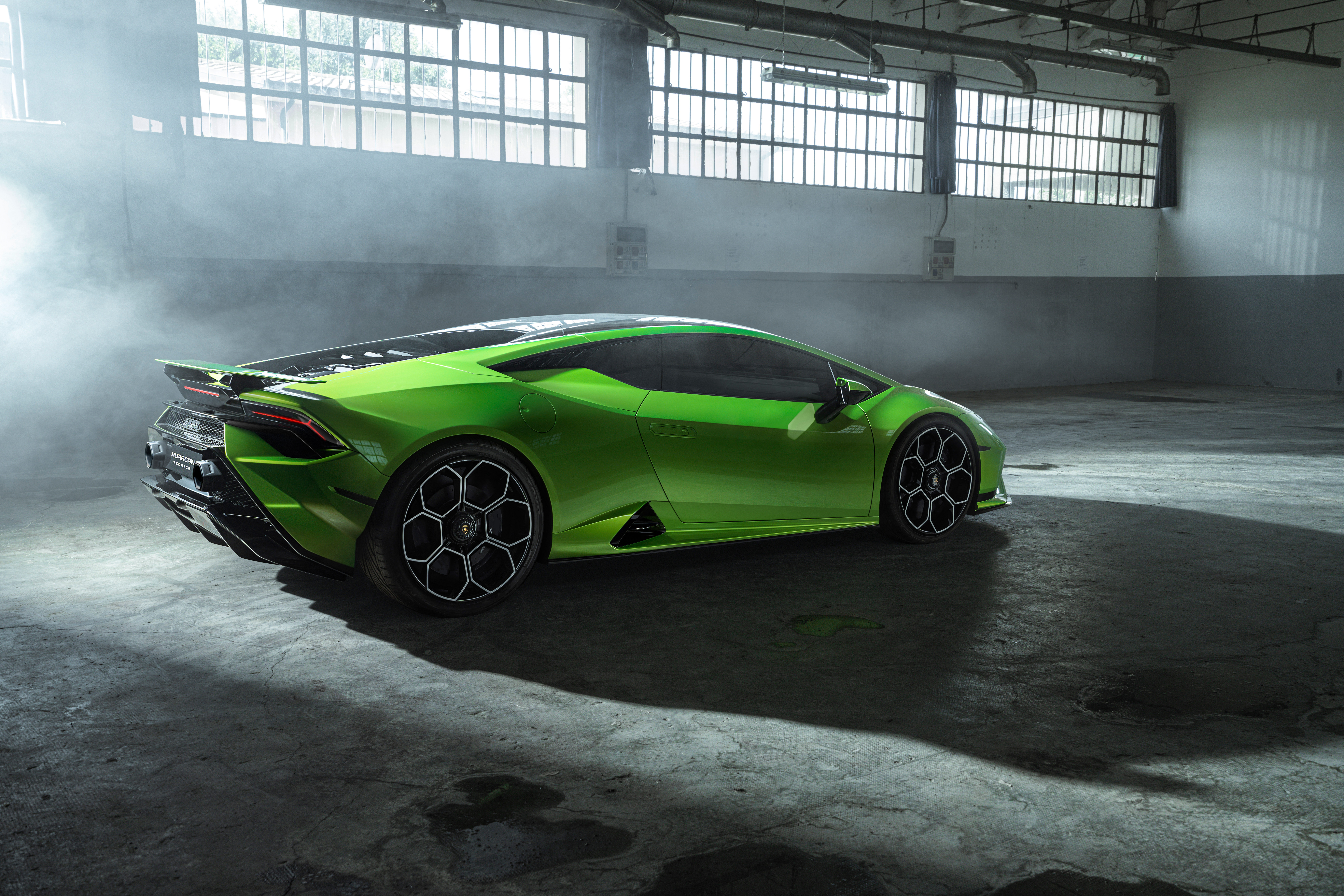 Green Lamborghini Huracán Tecnica in warehouse HD Wallpaper