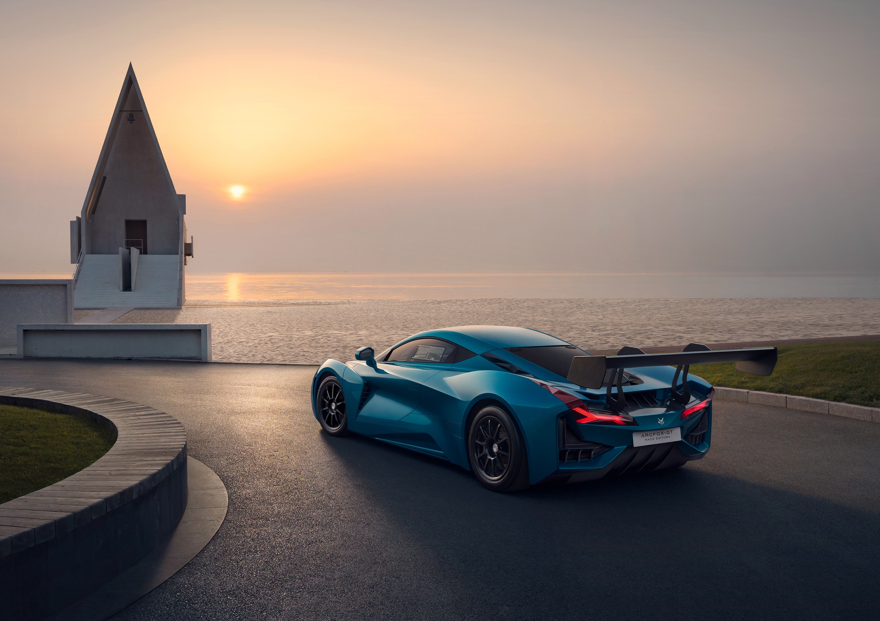 Arcfox-GT sports car by the sea at sunset HD Wallpaper