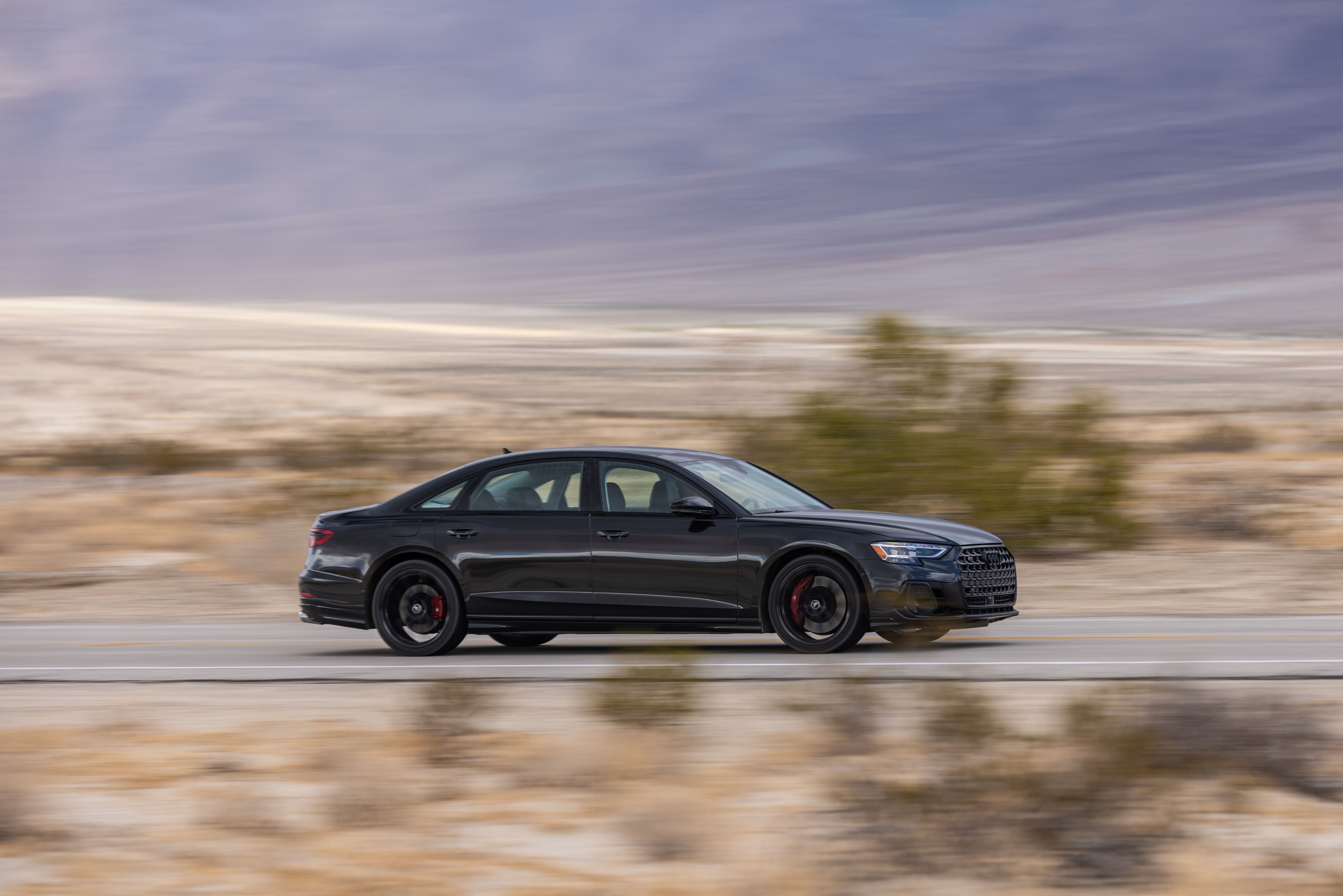 Audi S8 4K driving on a desert road HD Wallpaper