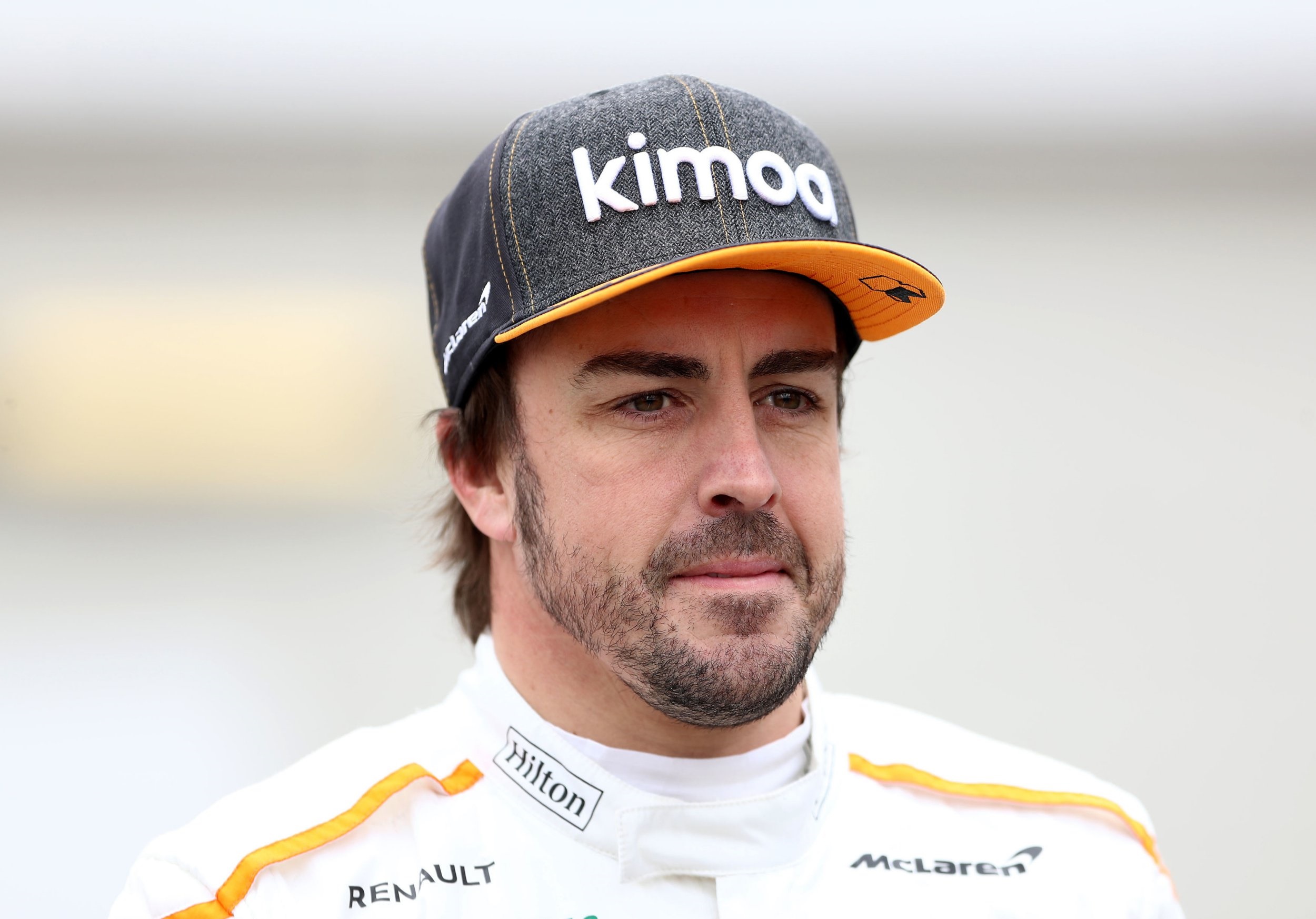Fernando Alonso wearing a Kimoa McLaren cap HD Wallpaper
