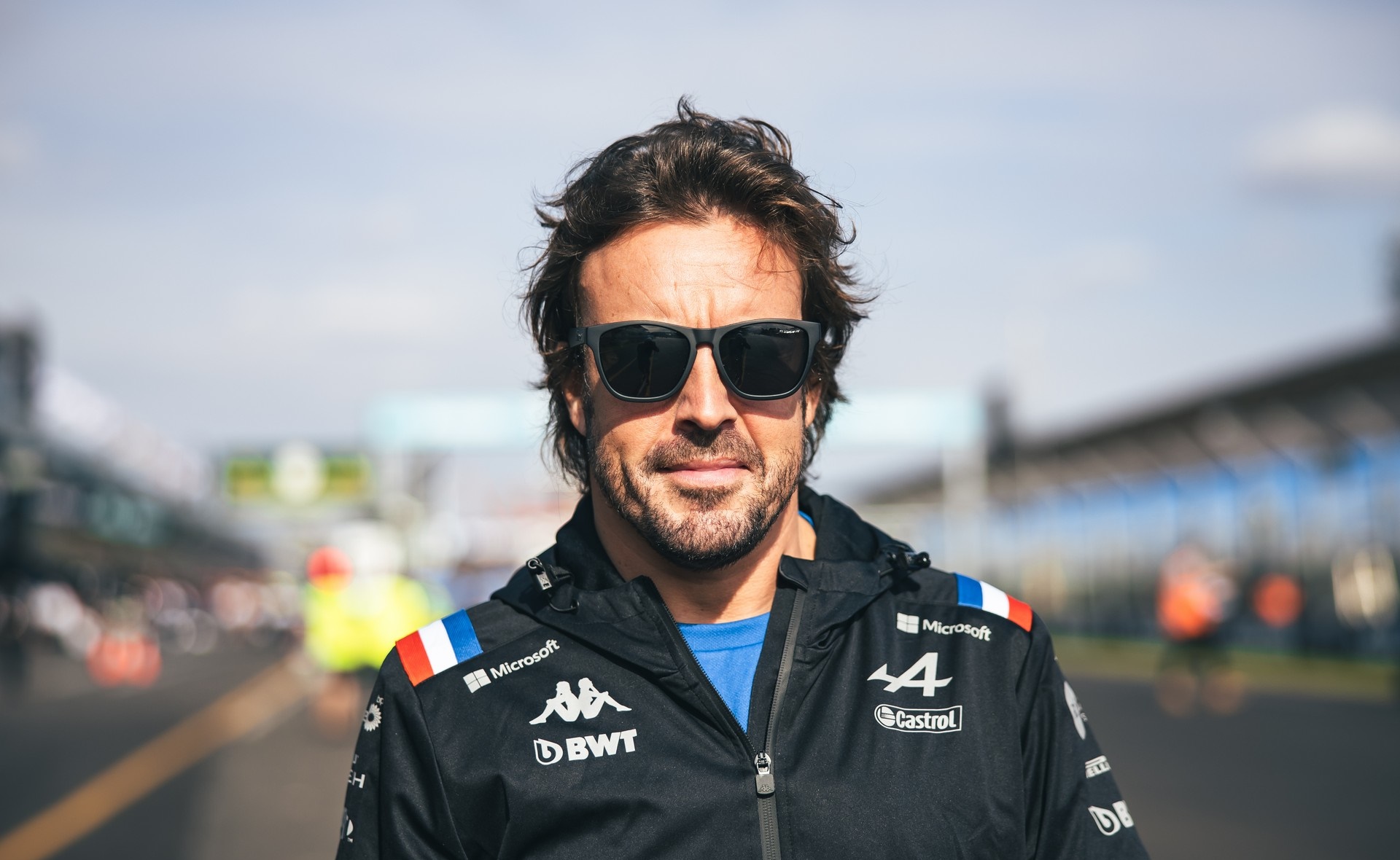 Fernando Alonso wearing Alpine F1 team jacket HD Wallpaper