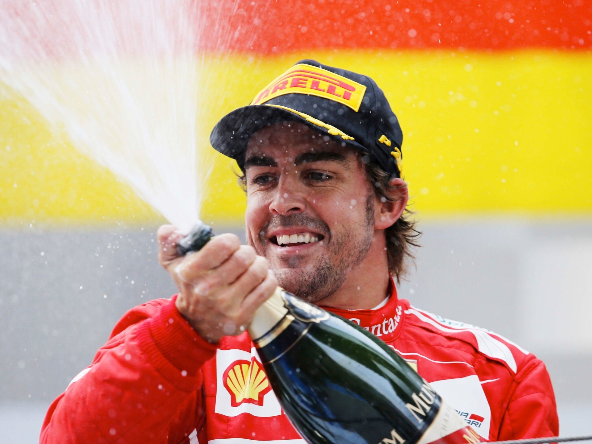 Fernando Alonso celebrating with champagne HD Wallpaper