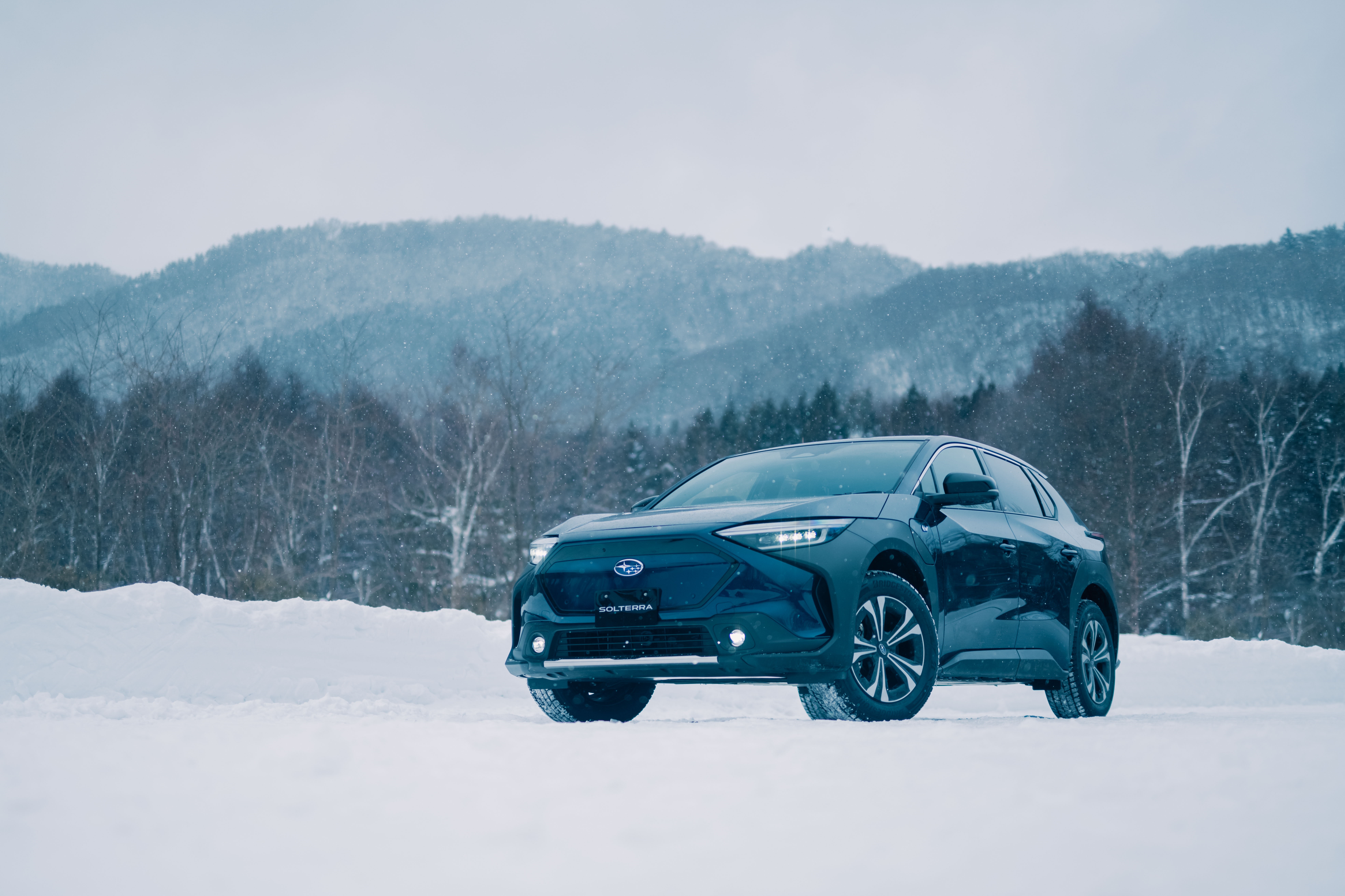 Subaru Solterra in a Snowy Landscape HD Wallpaper