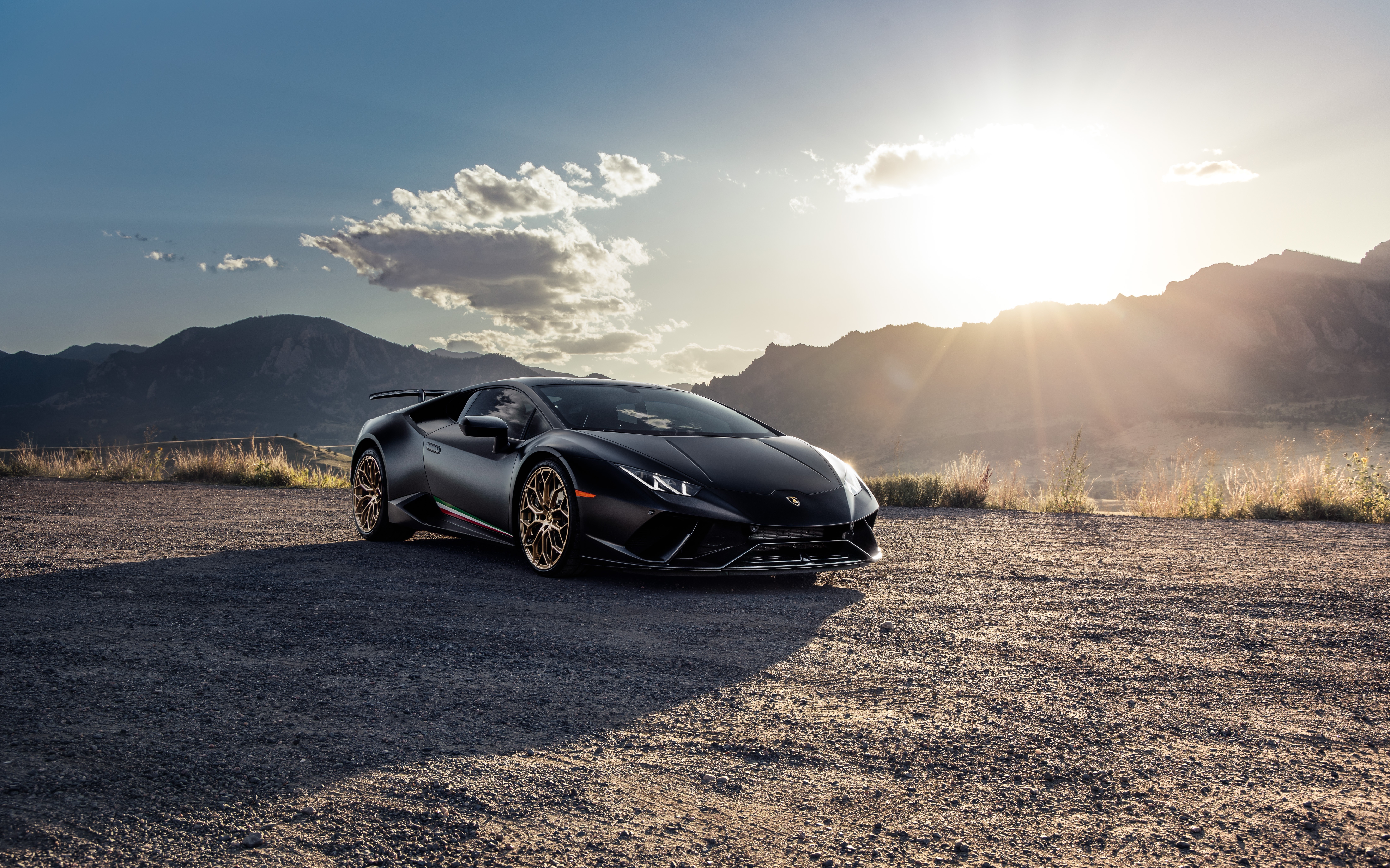 Black Lamborghini Huracan on a dirt road HD Wallpaper
