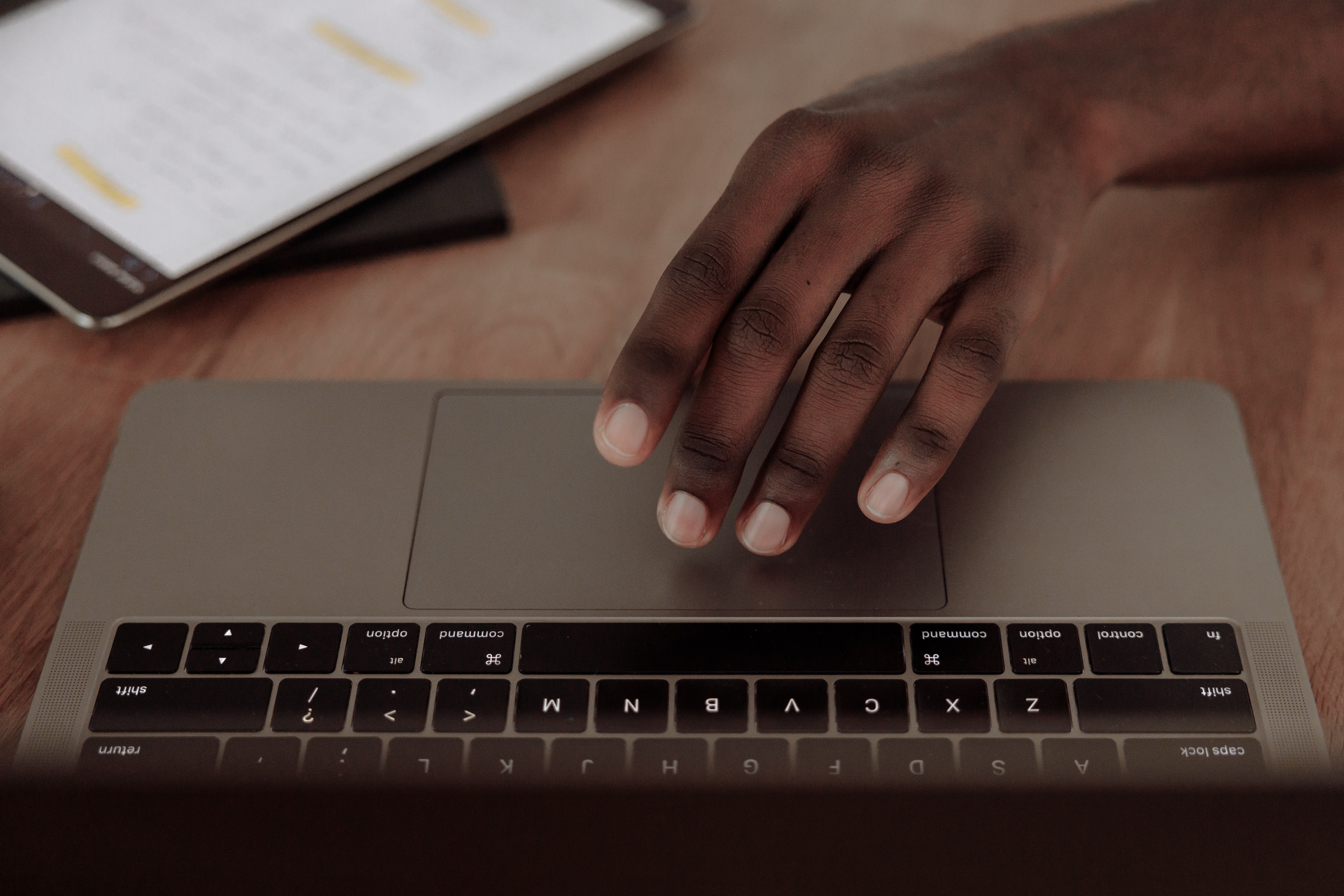 Hand on Laptop Keyboard HD Wallpaper