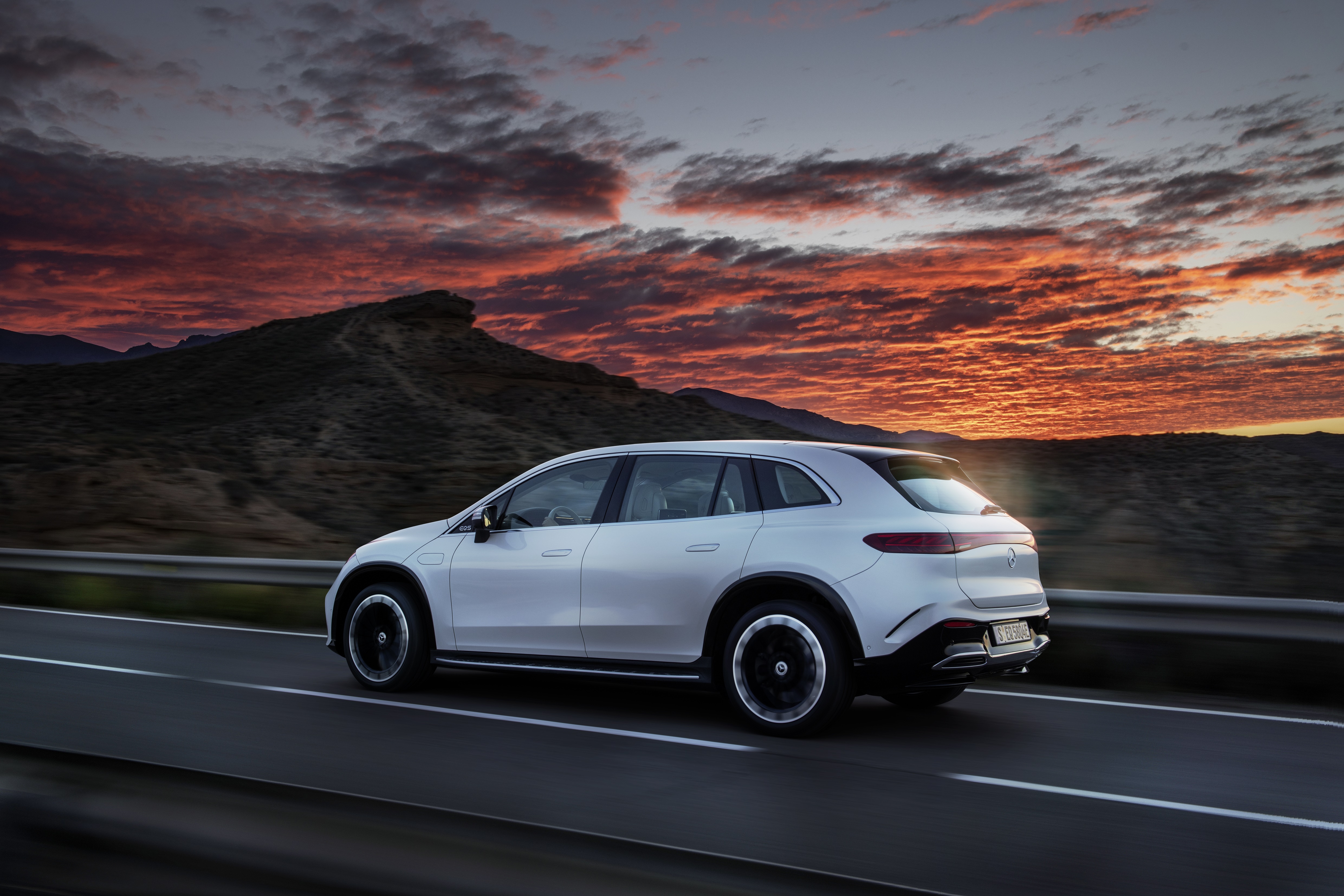 Mercedes-Benz EQS 450+ 4K driving at sunset HD Wallpaper