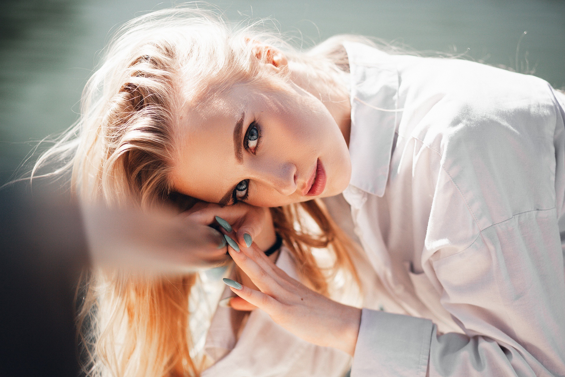 Young woman with blonde hair wearing a white shirt HD Wallpaper