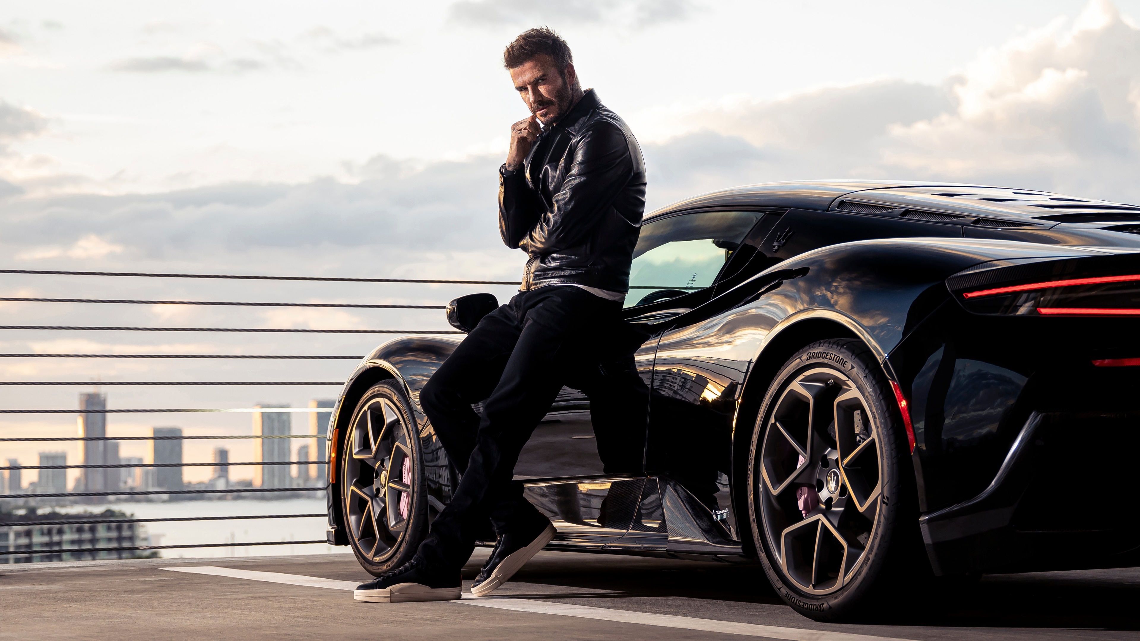 David Beckham Poses with a Black Maserati Car HD Wallpaper