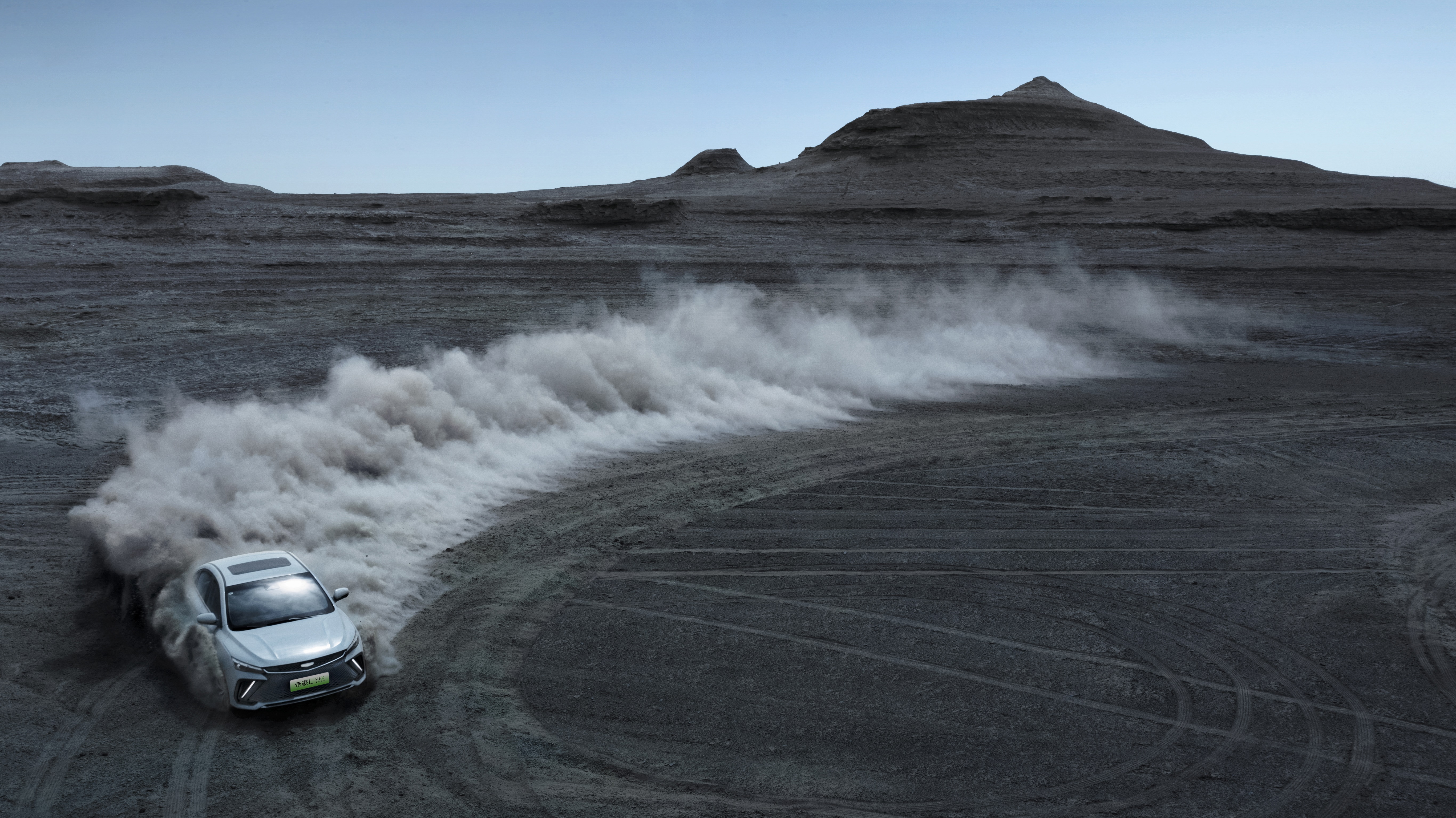 Geely Emgrand L Hi·X drifting in desert 4K HD Wallpaper